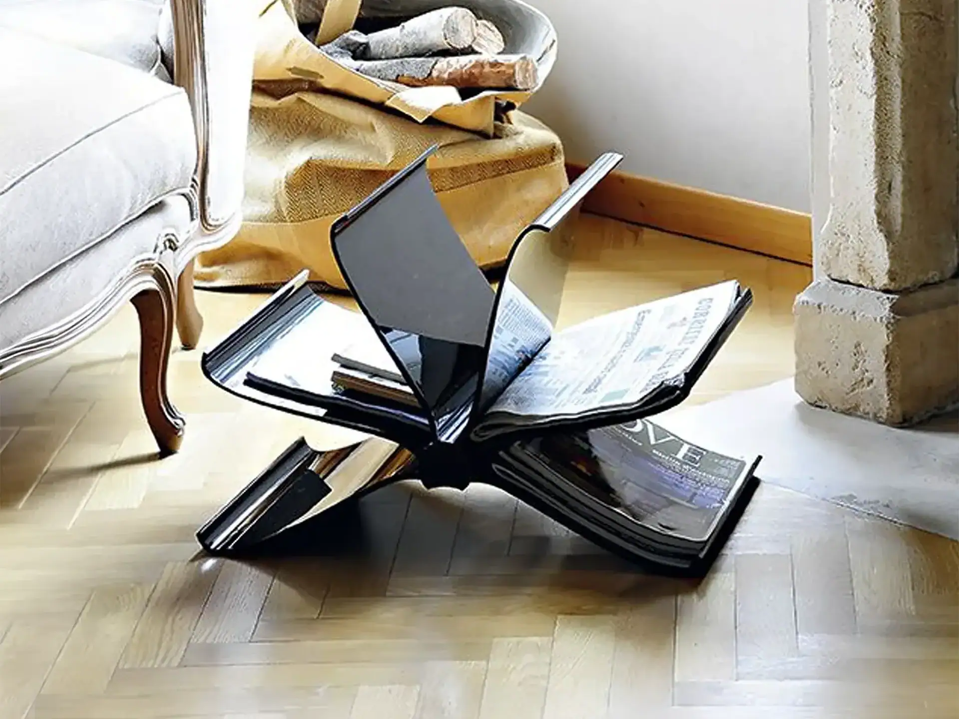 Magazine rack with a modern, artistic design for stylish storage.