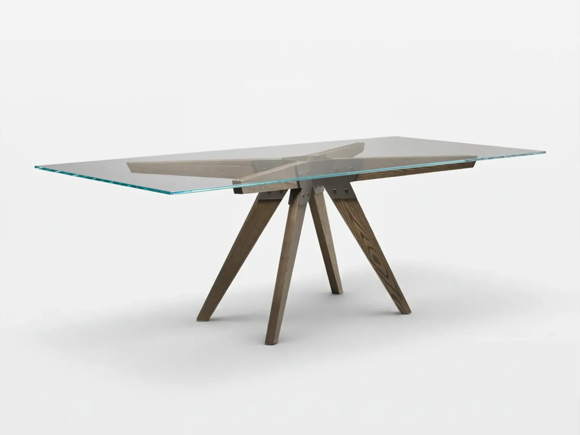 A modern dining table with a clear rectangular glass top and a dark wooden base with splayed, angled legs, set against a white background.