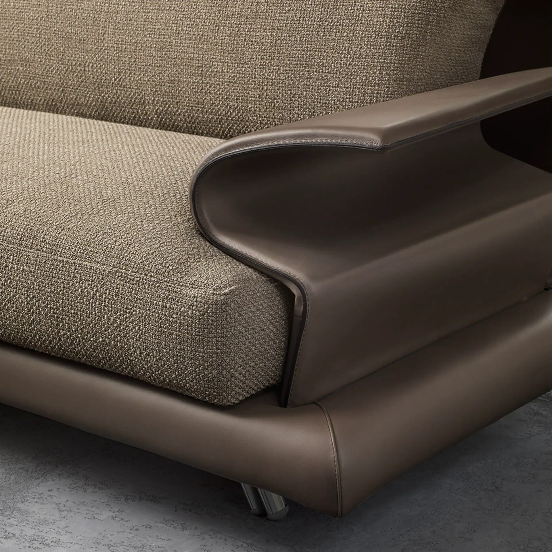 Modern Super Roy sofa with textured fabric and sleek leather accents.