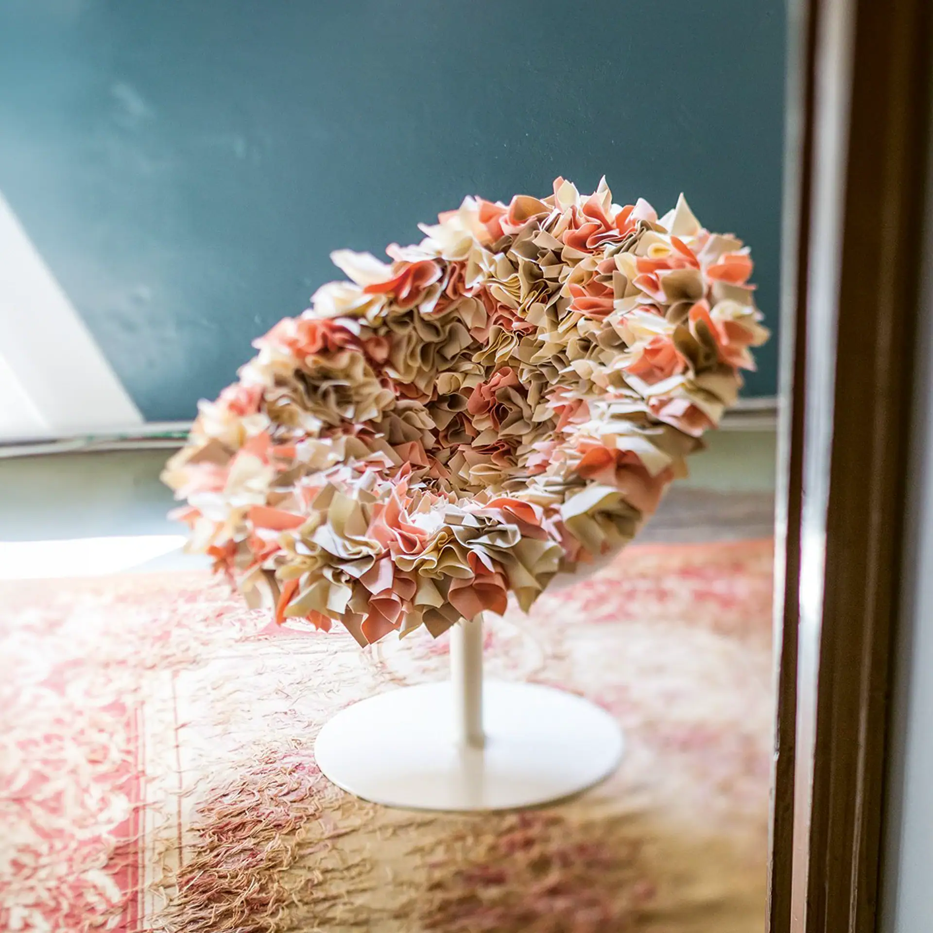 Elegant Bouquet Swivel Armchair with floral fabric design.