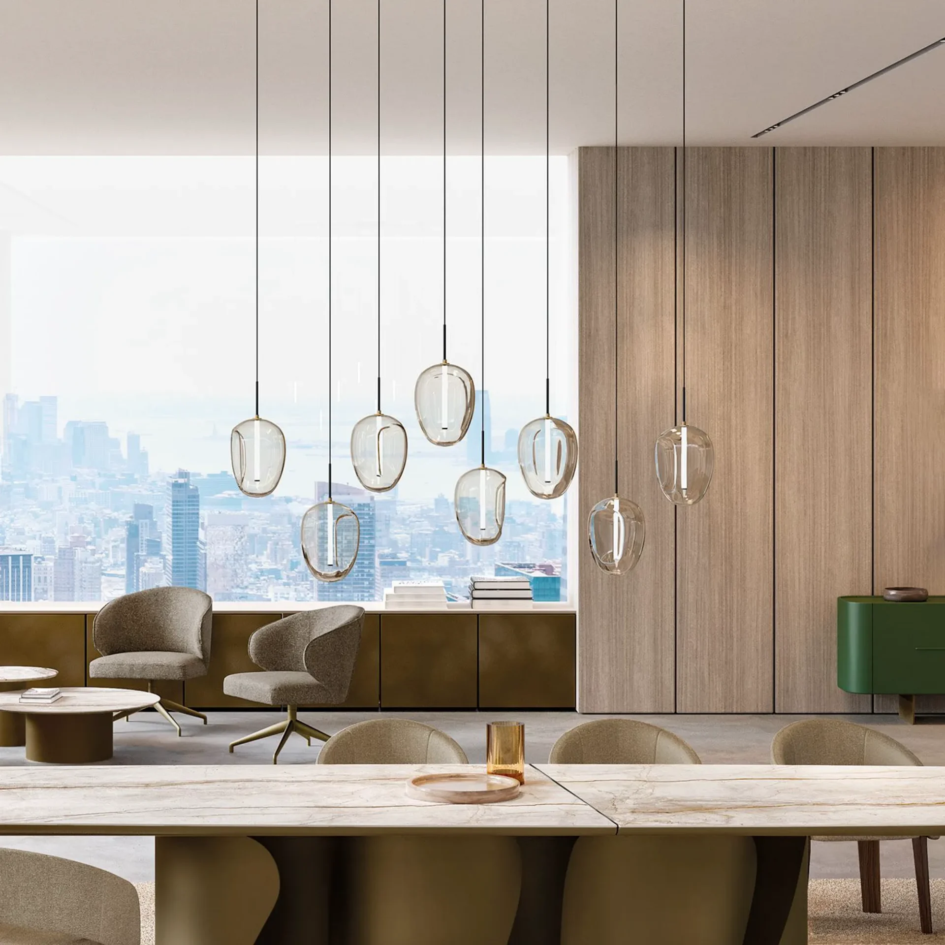 A modern interior with a dining table, lounge chairs, and unique glass pendant lights, overlooking a city skyline from a large window.