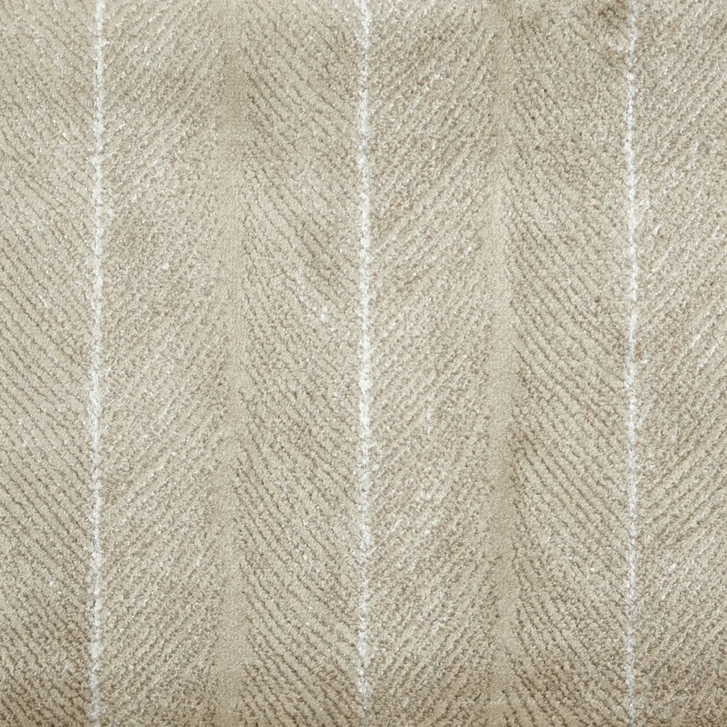 Close-up of a light beige textured fabric with a herringbone pattern and subtle vertical white pinstripes.
