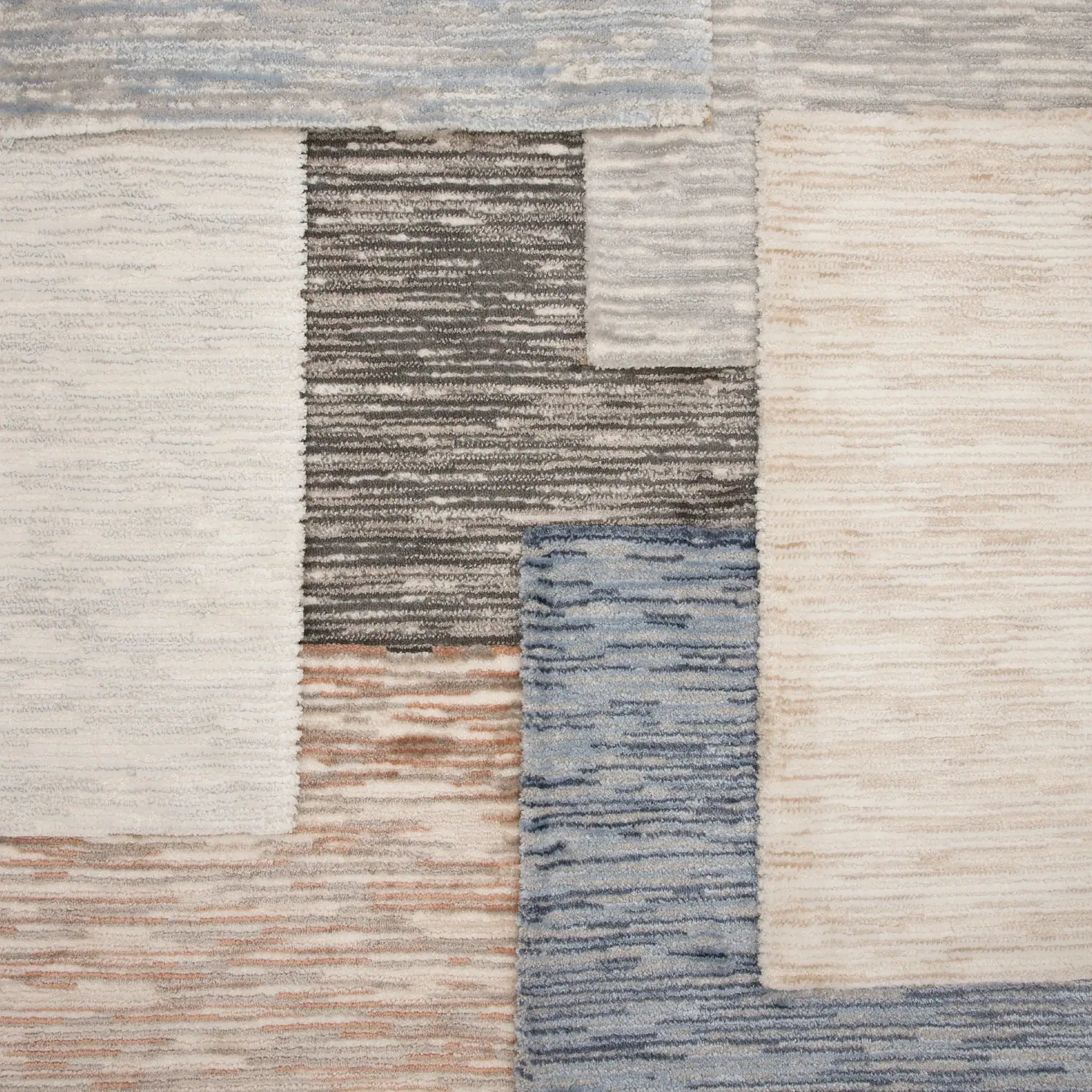 Clairbella area rug with geometric pattern in neutral tones.