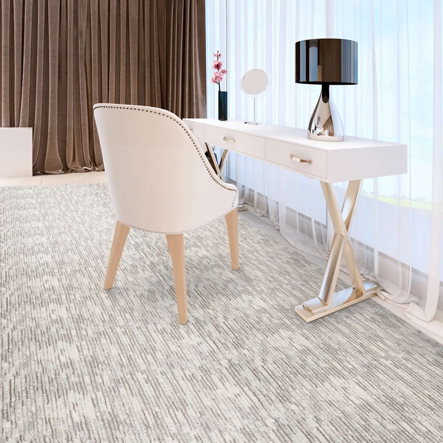 A modern room featuring a cream and taupe abstract linear patterned rug, a white desk with gold X-legs, and a white upholstered chair.