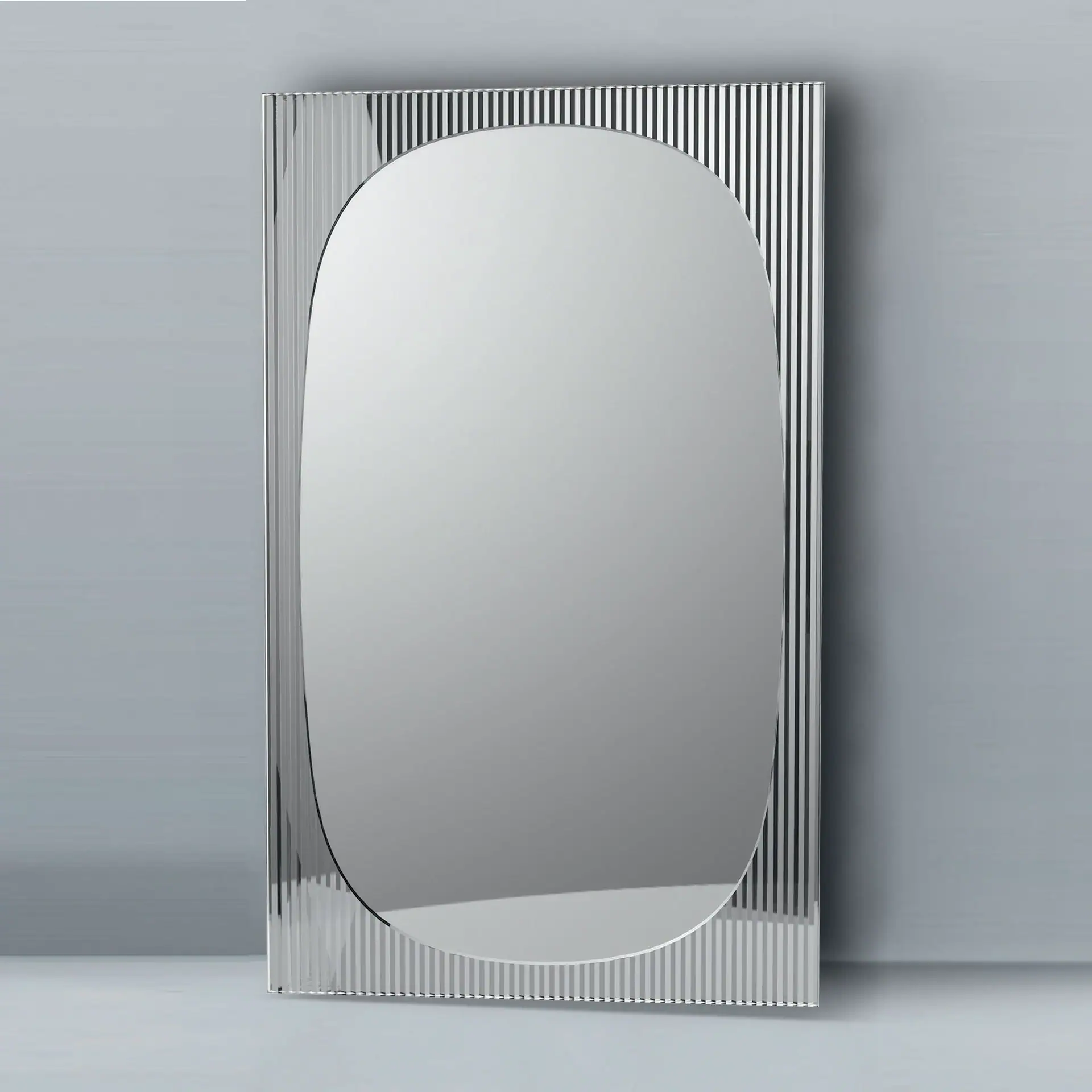 Elegant oval wall mirror with striped metal frame for contemporary decor.