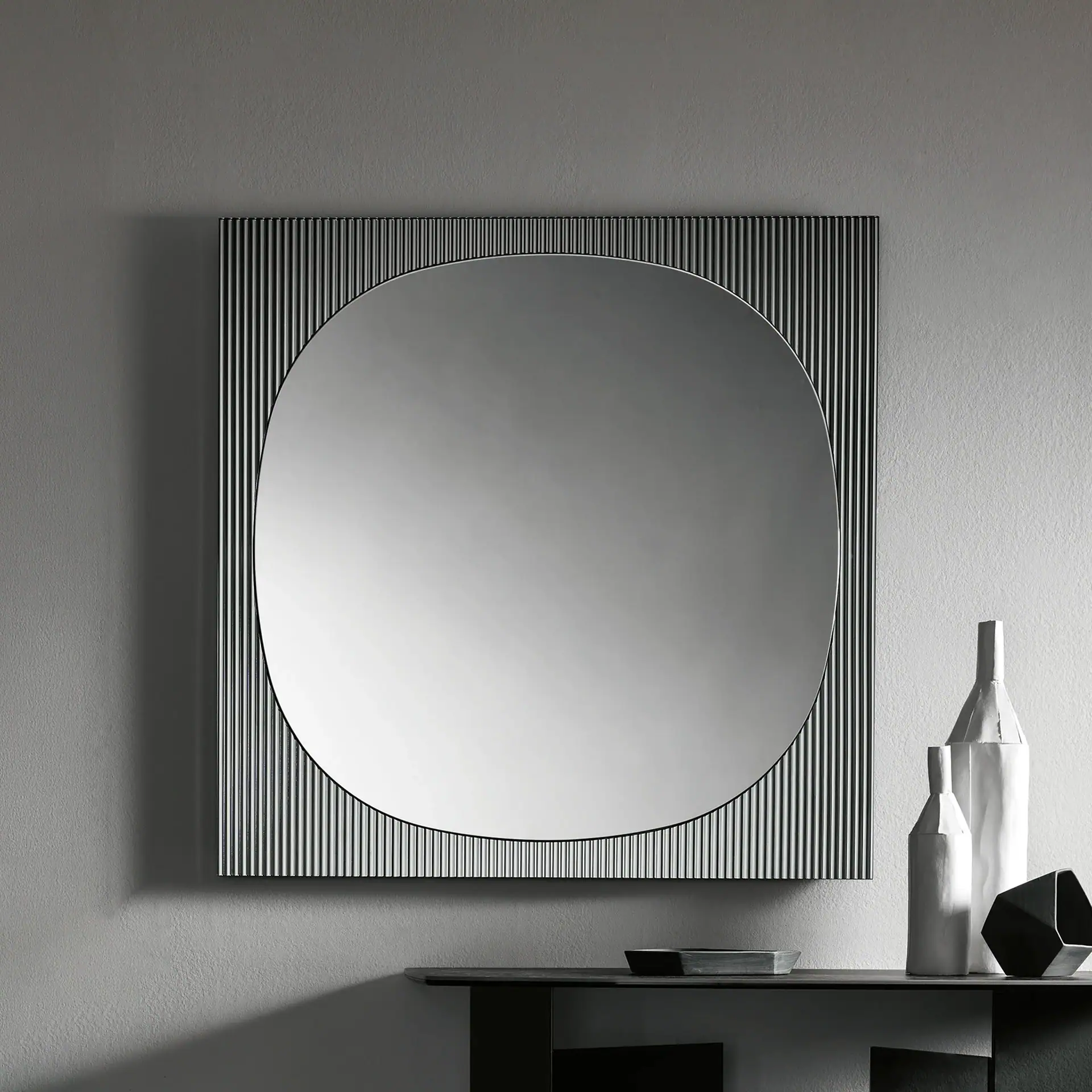 Contemporary square wall mirror with textured frame, ideal for modern interiors.