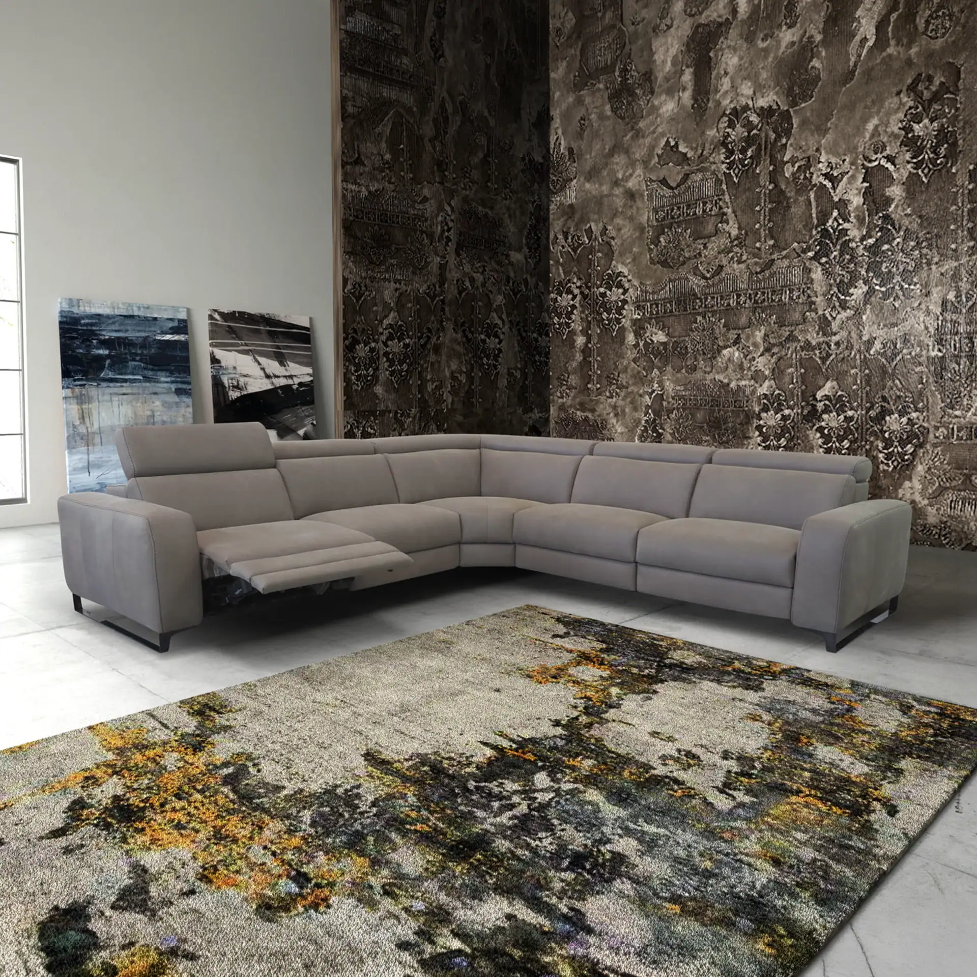 Elegant L-shaped sectional sofa with adjustable headrests in a contemporary living room.