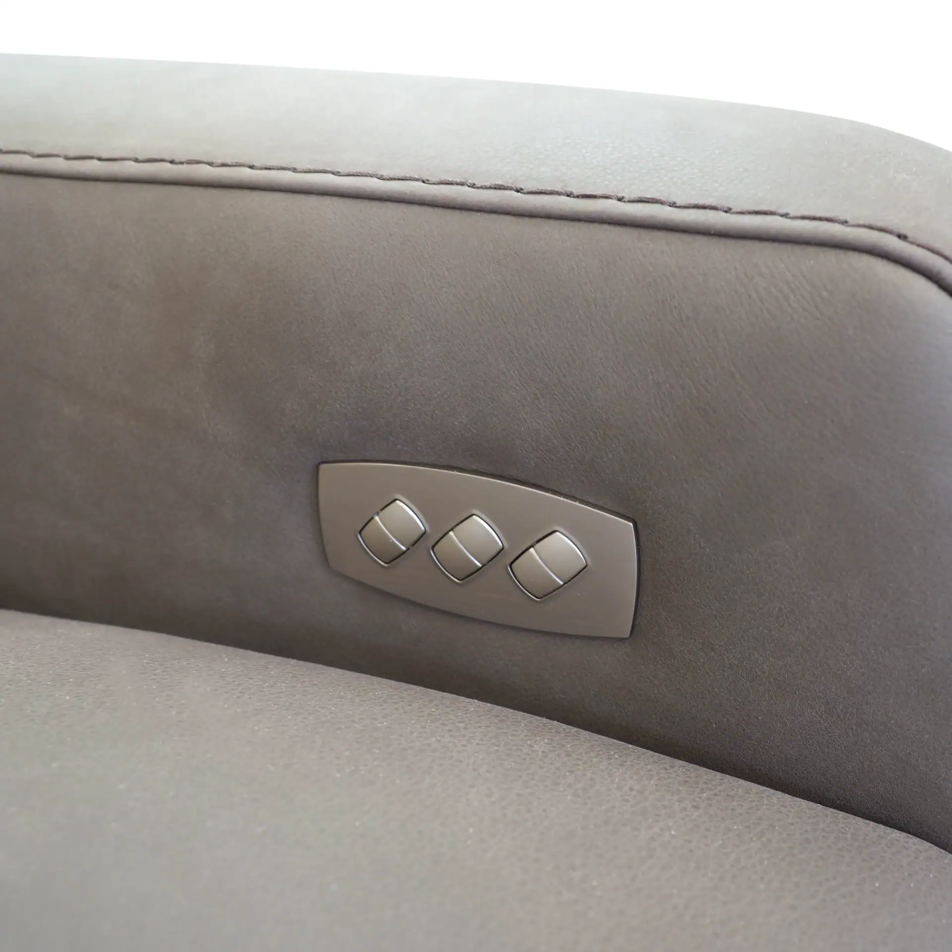 Recliner chair featuring built-in power adjustment buttons for customizable comfort. Perfect for liv.