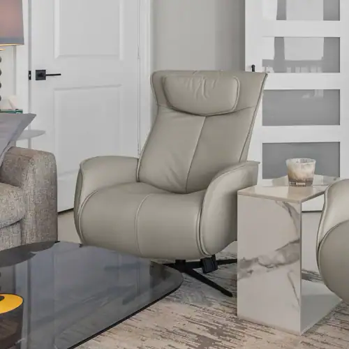 Leather recliner chair with plush cushioning and ergonomic design for comfort and style. Perfect for.