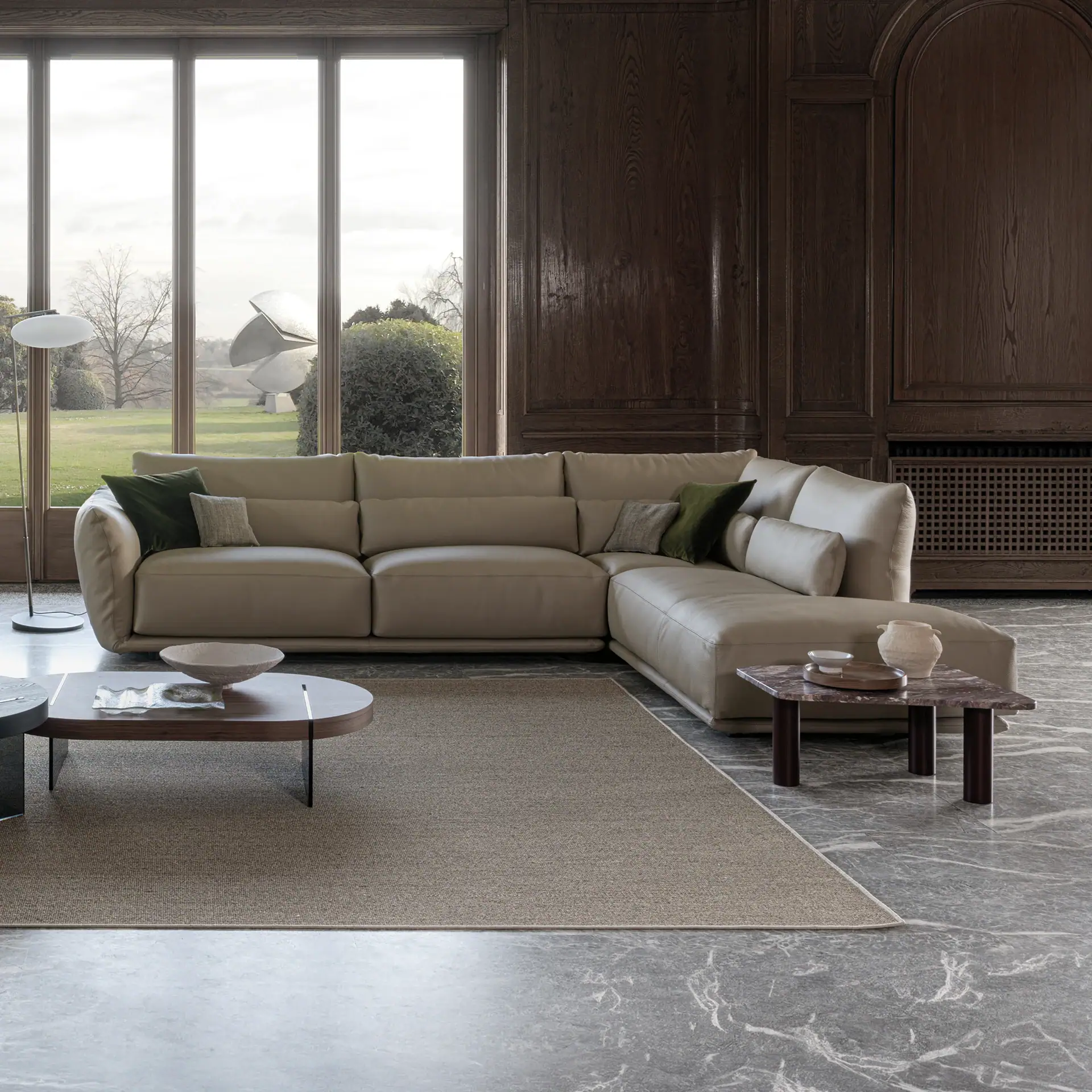 Elegant beige Clift sectional sofa in a modern living room setting.