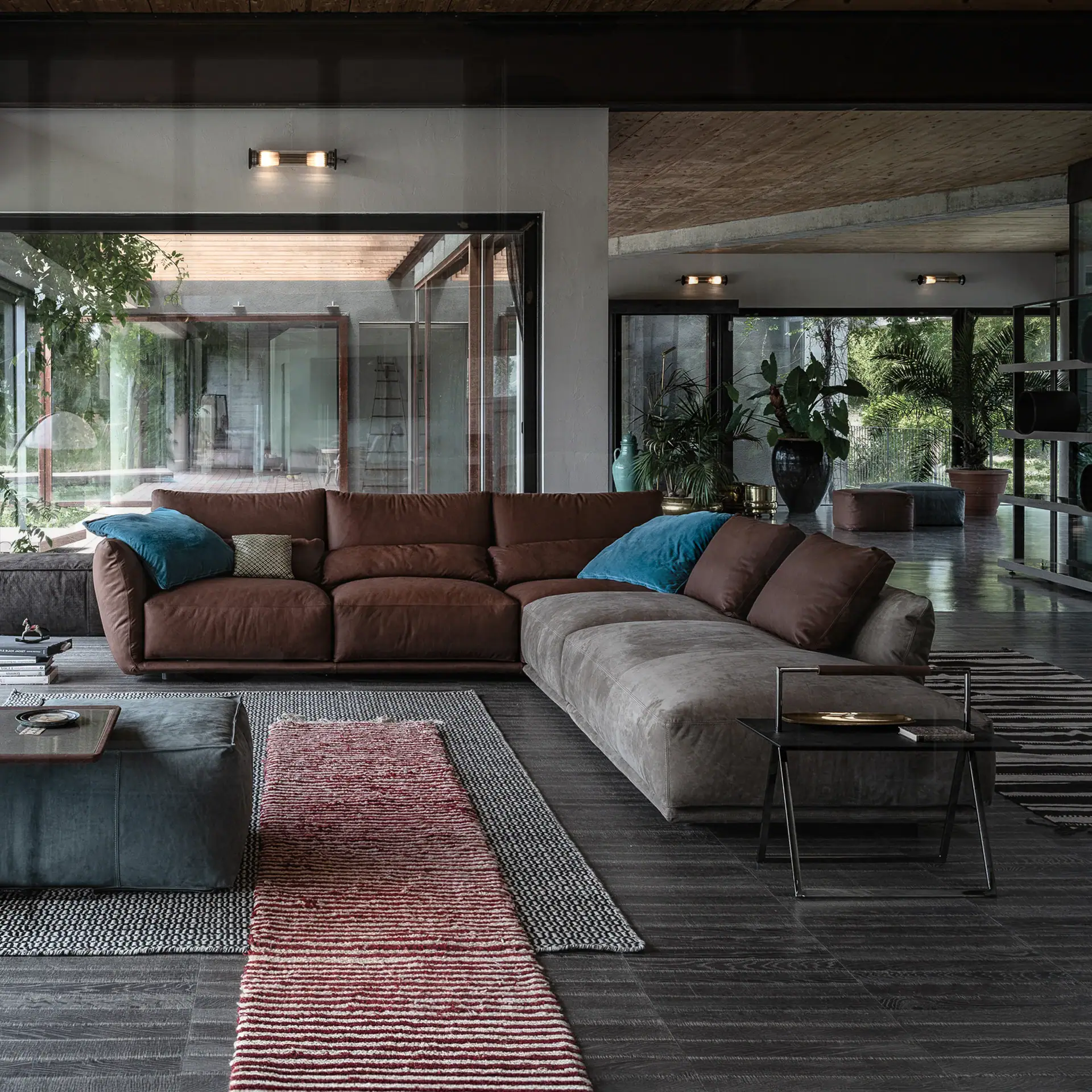 Elegant Clift sectional sofa in a contemporary living space with large windows and stylish decor.