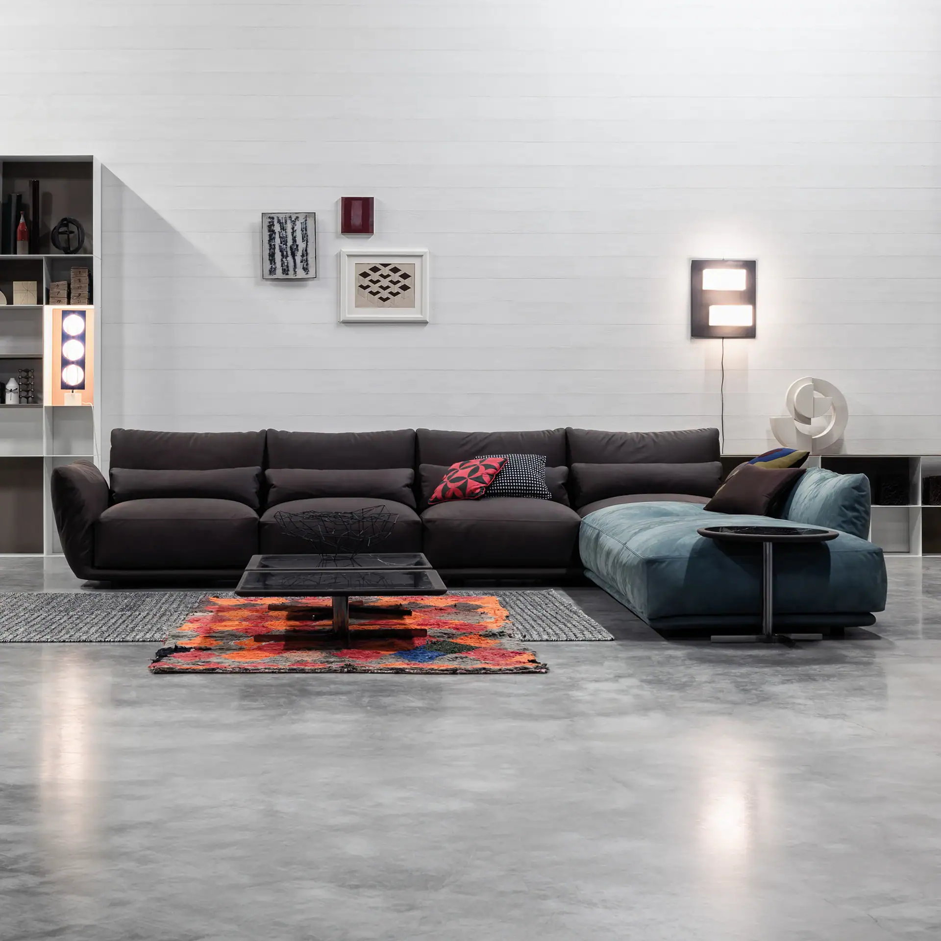 Modern Clift sectional sofa with black and blue upholstery in a contemporary living space.