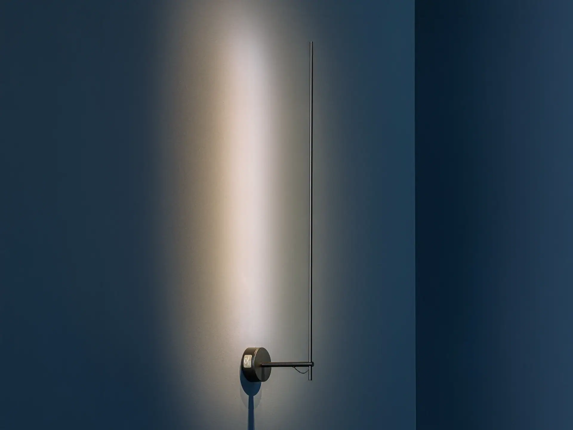 Modern Catellani & Smith Light Stick wall light with sleek design and ambient glow.
