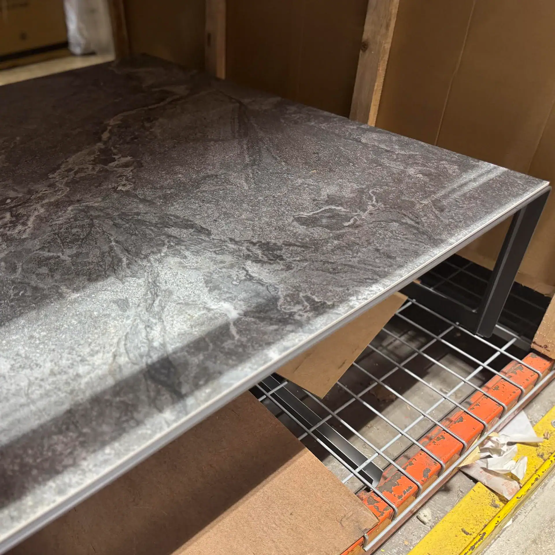 Modern Cattelan Italia Kitano D coffee table with marble top and metal frame.