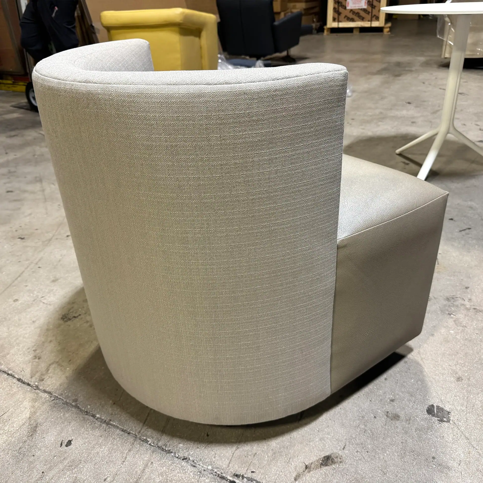 Modern Lazar Mandalay game chair with curved back and plush upholstery.