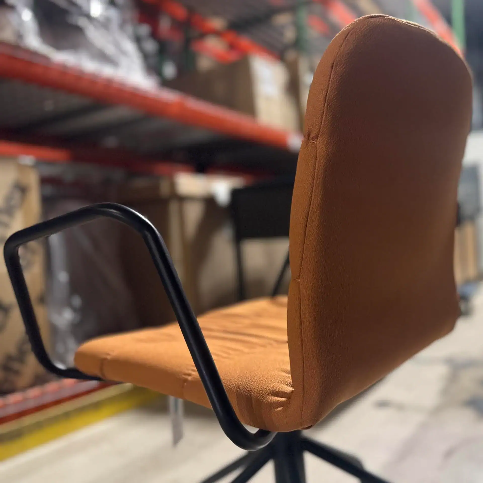 Comfortable Midj Liù armchair with cushioned back and seat, perfect for modern office or home use.