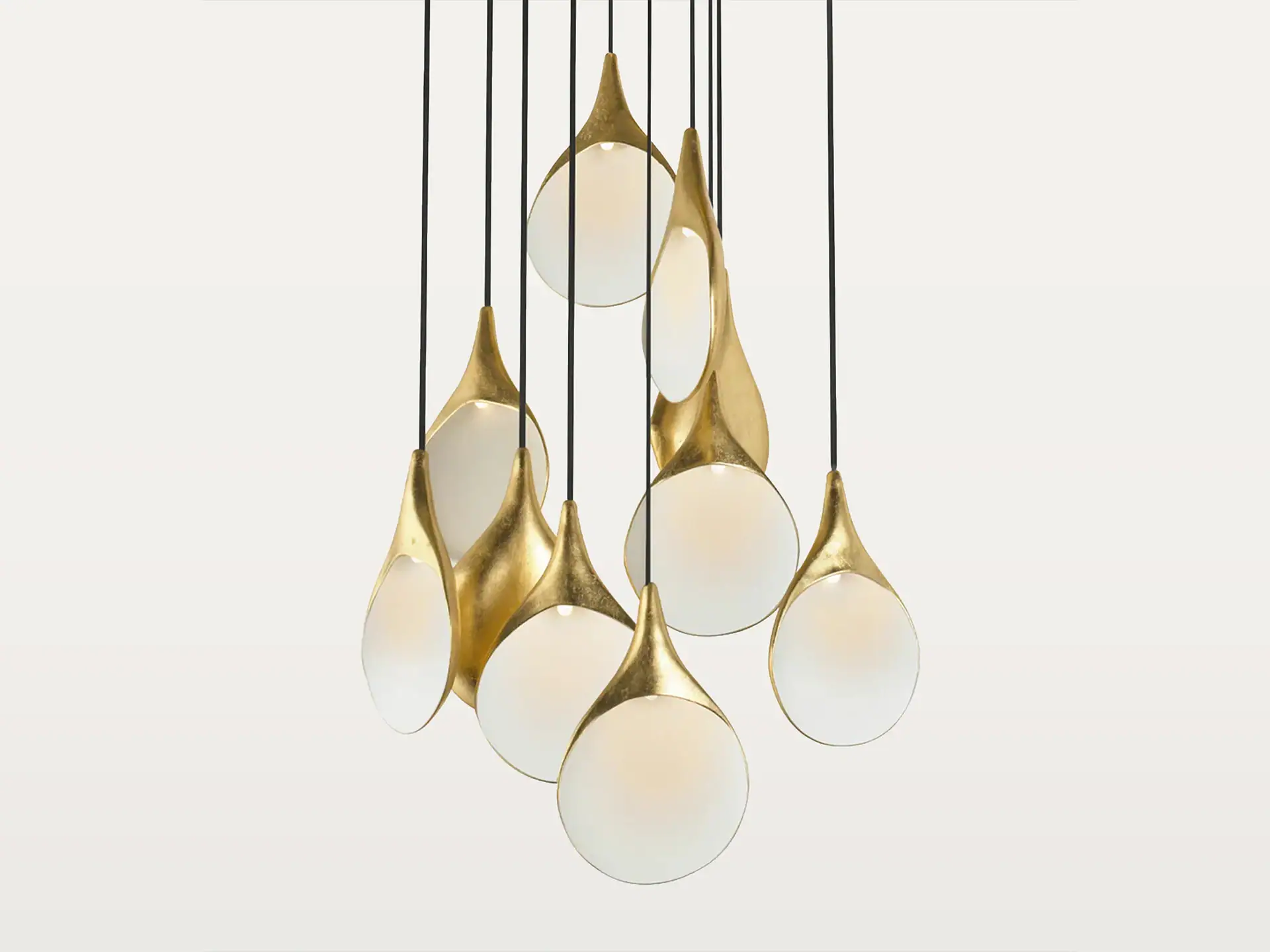Stillabunt Chandelier with gold accents and frosted glass globes for modern lighting.