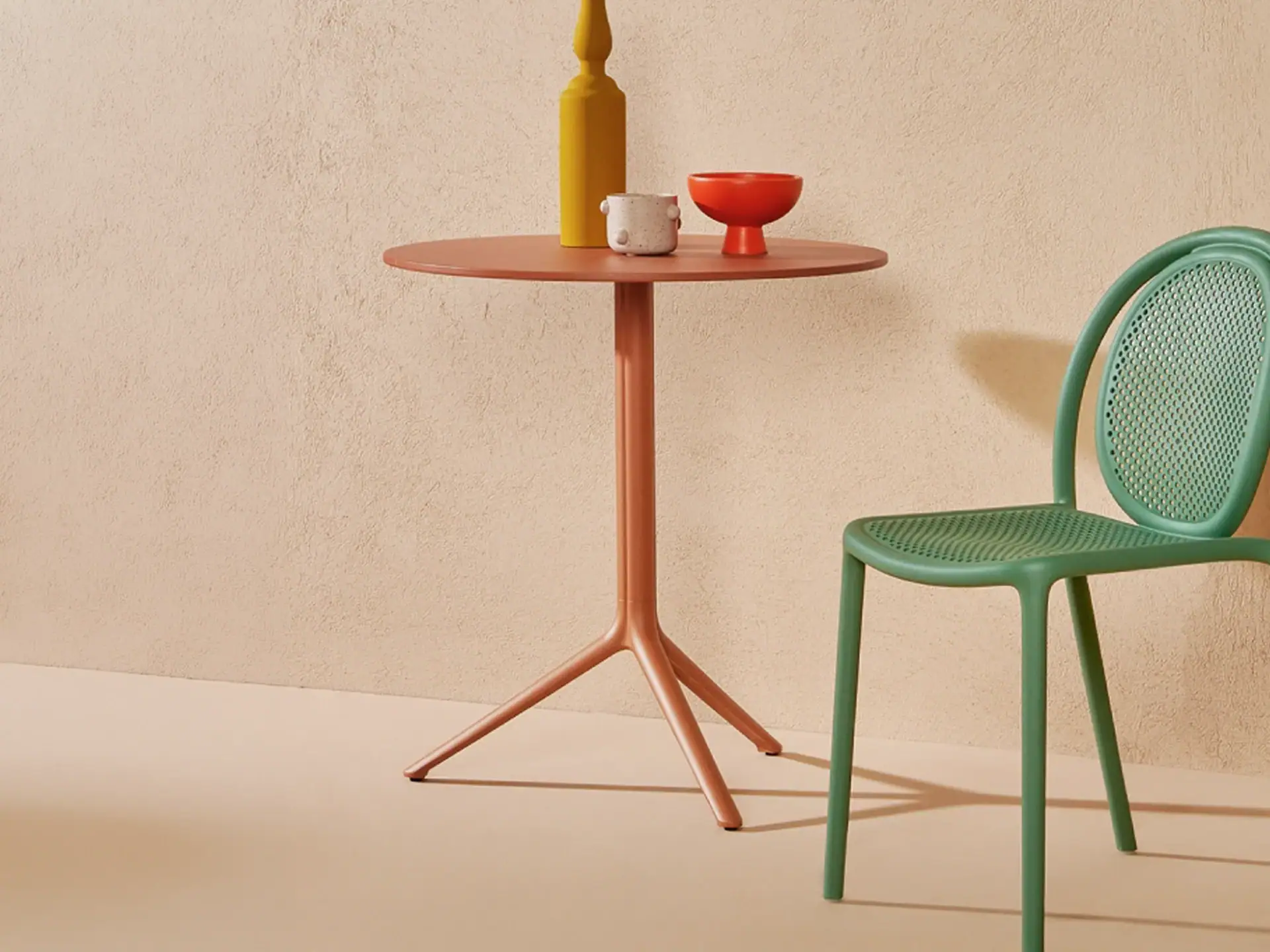 Outdoor dining table for patio or garden spaces.