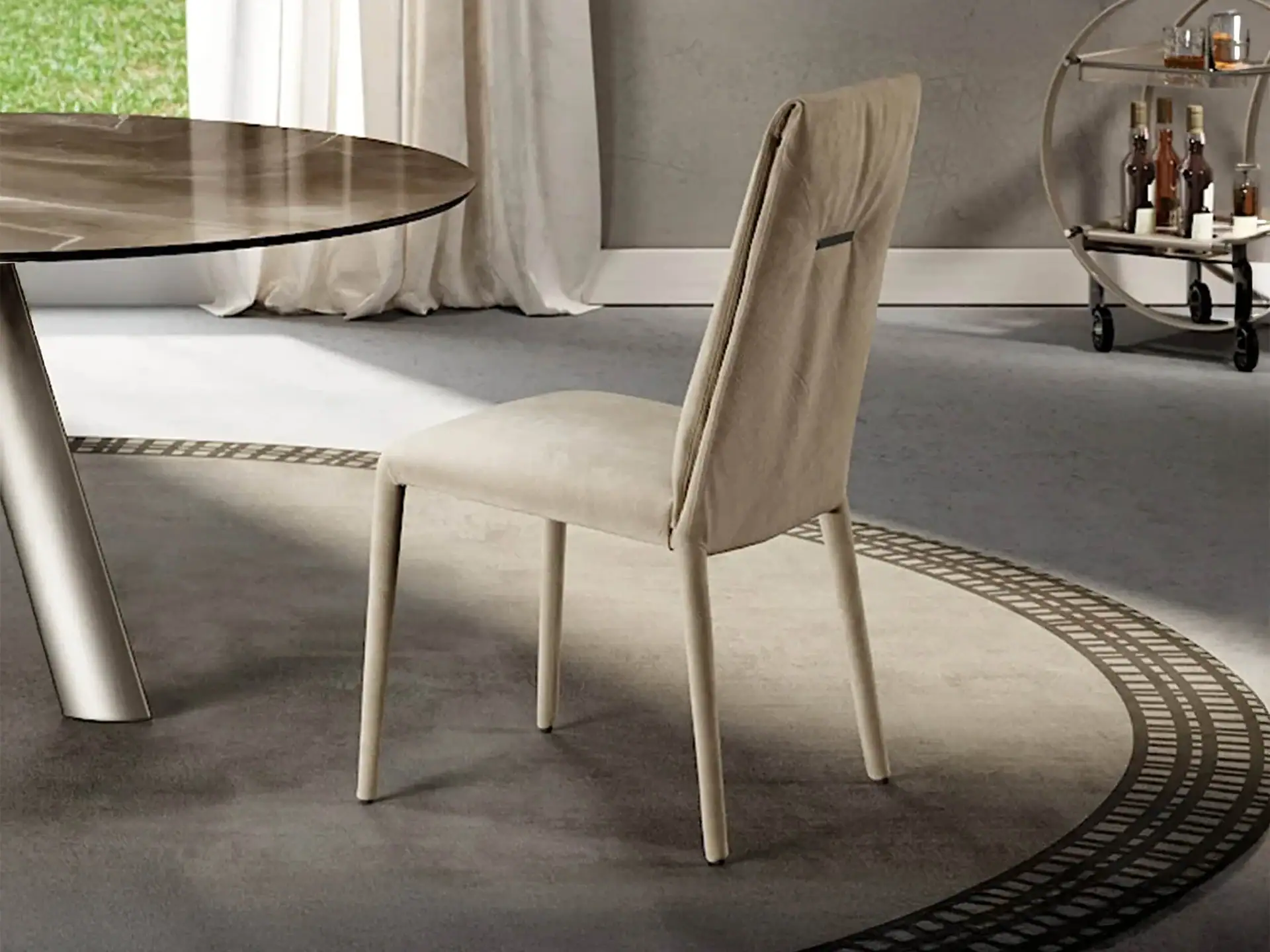 Modern beige upholstered dining chair with wooden legs in a stylish interior setting.