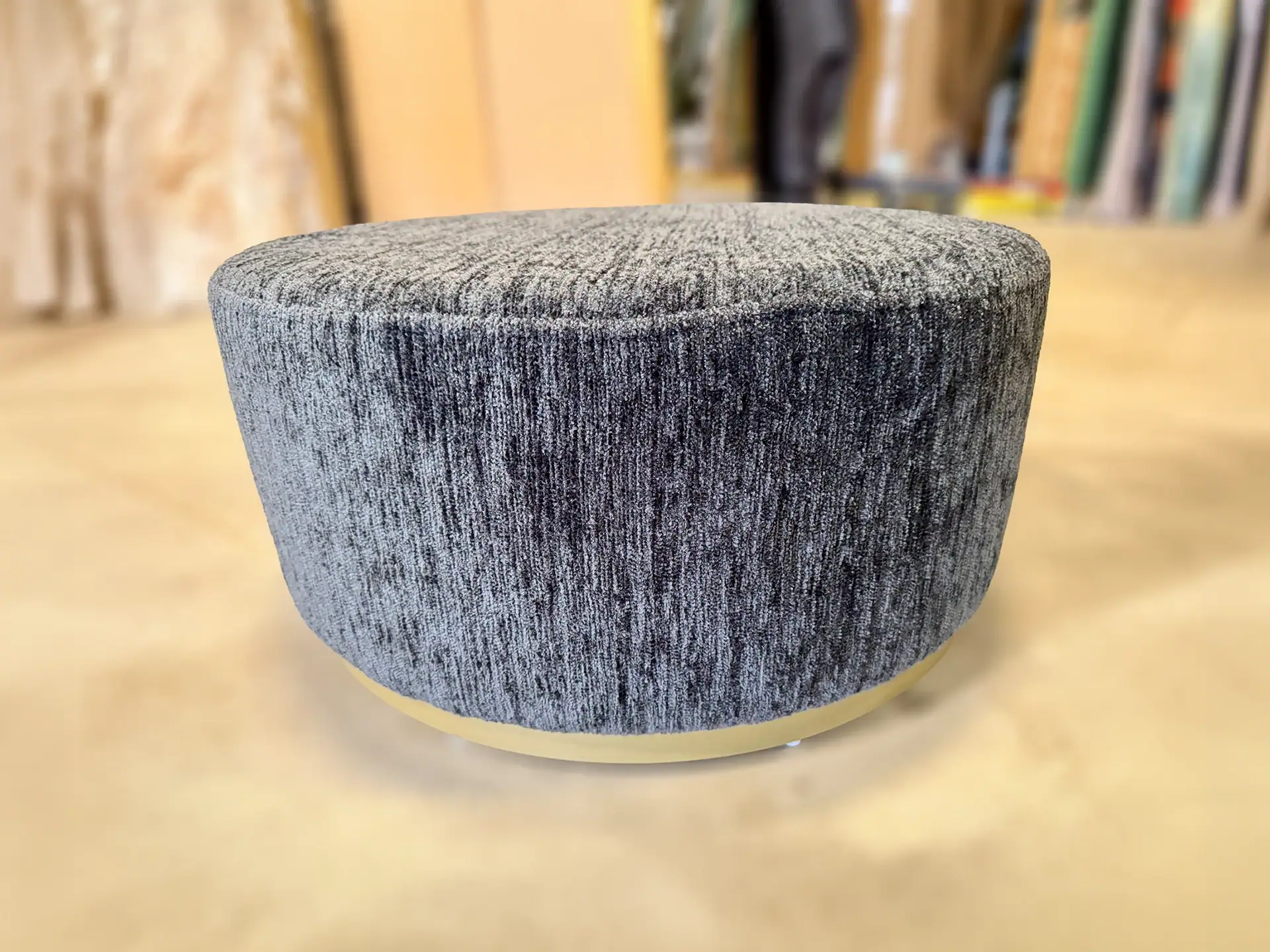 Gray Marshmallow Ottoman with textured fabric for modern decor.
