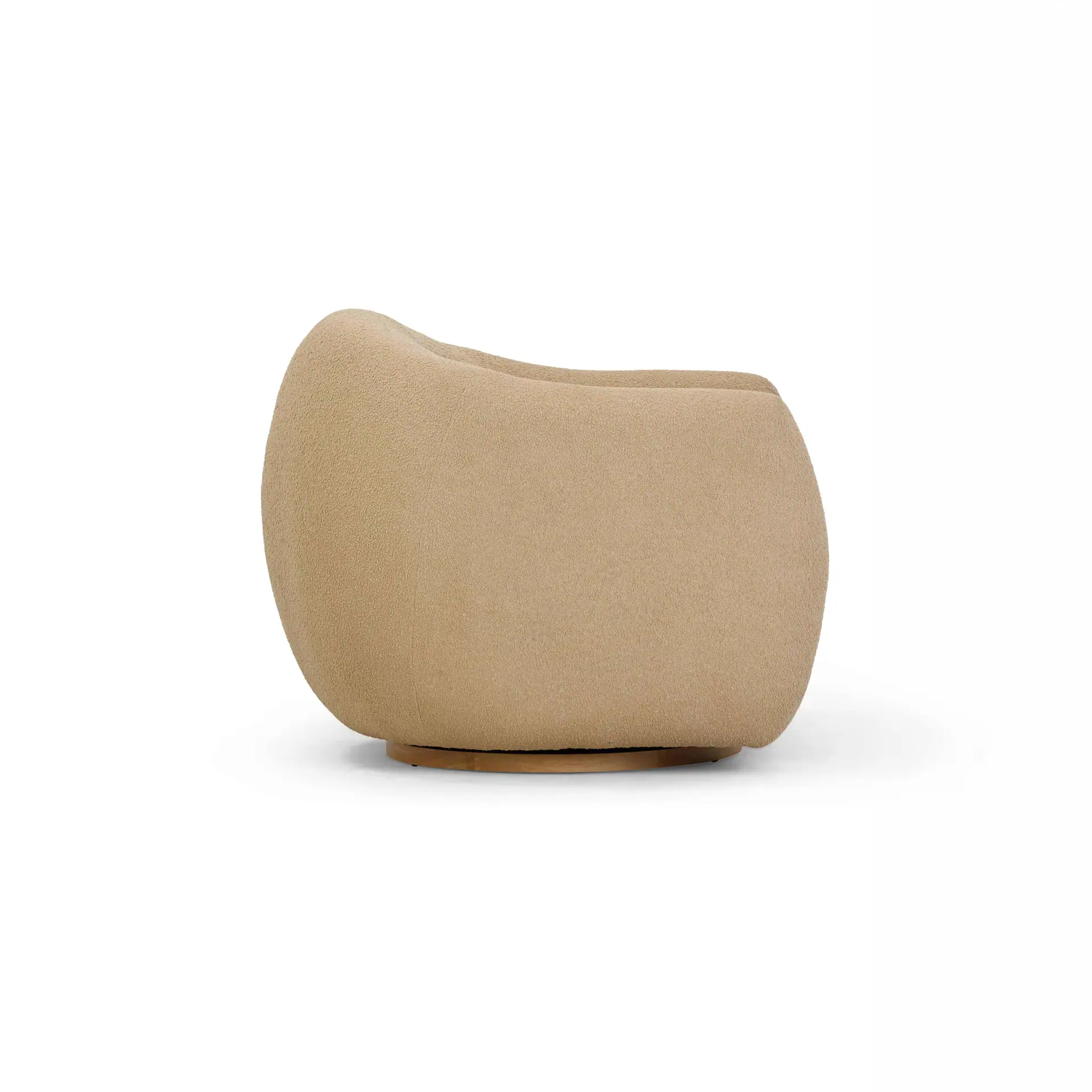 Modern beige lounge chair with soft fabric upholstery and rounded design.