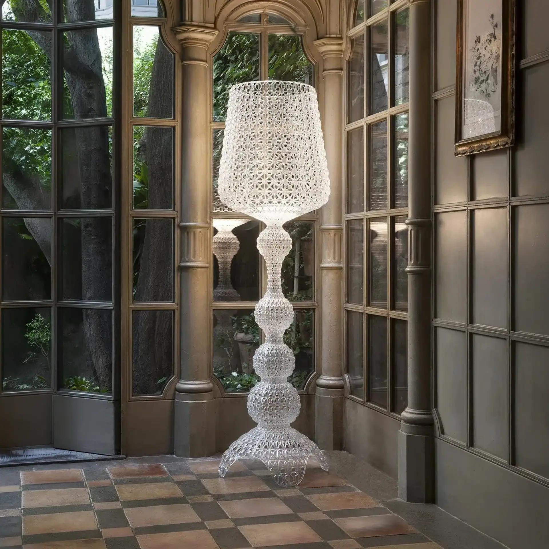 Outdoor floor lamp with intricate glass design for elegant lighting.