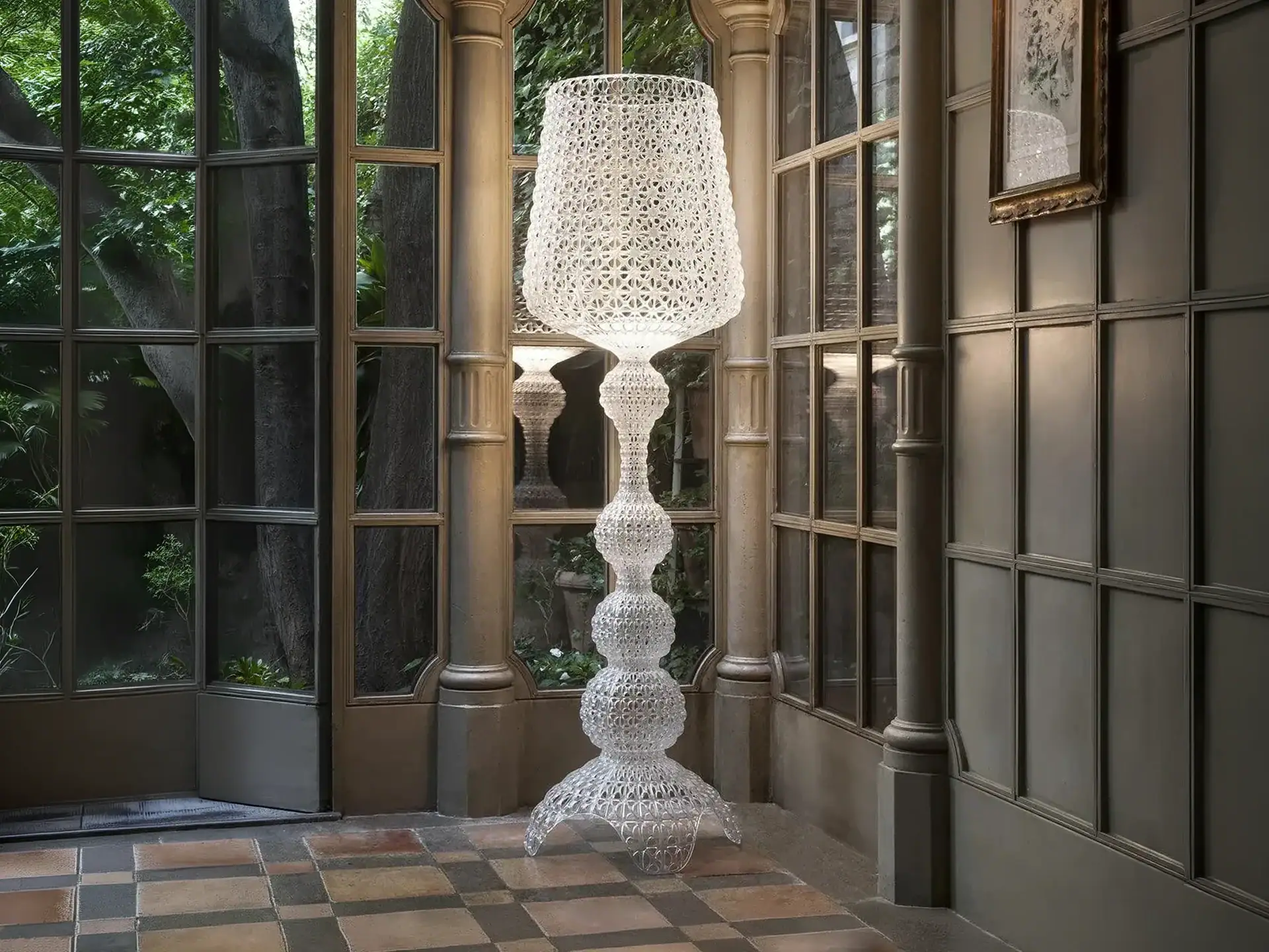 Elegant outdoor floor lamp with a textured, sculptural design by Kartell.