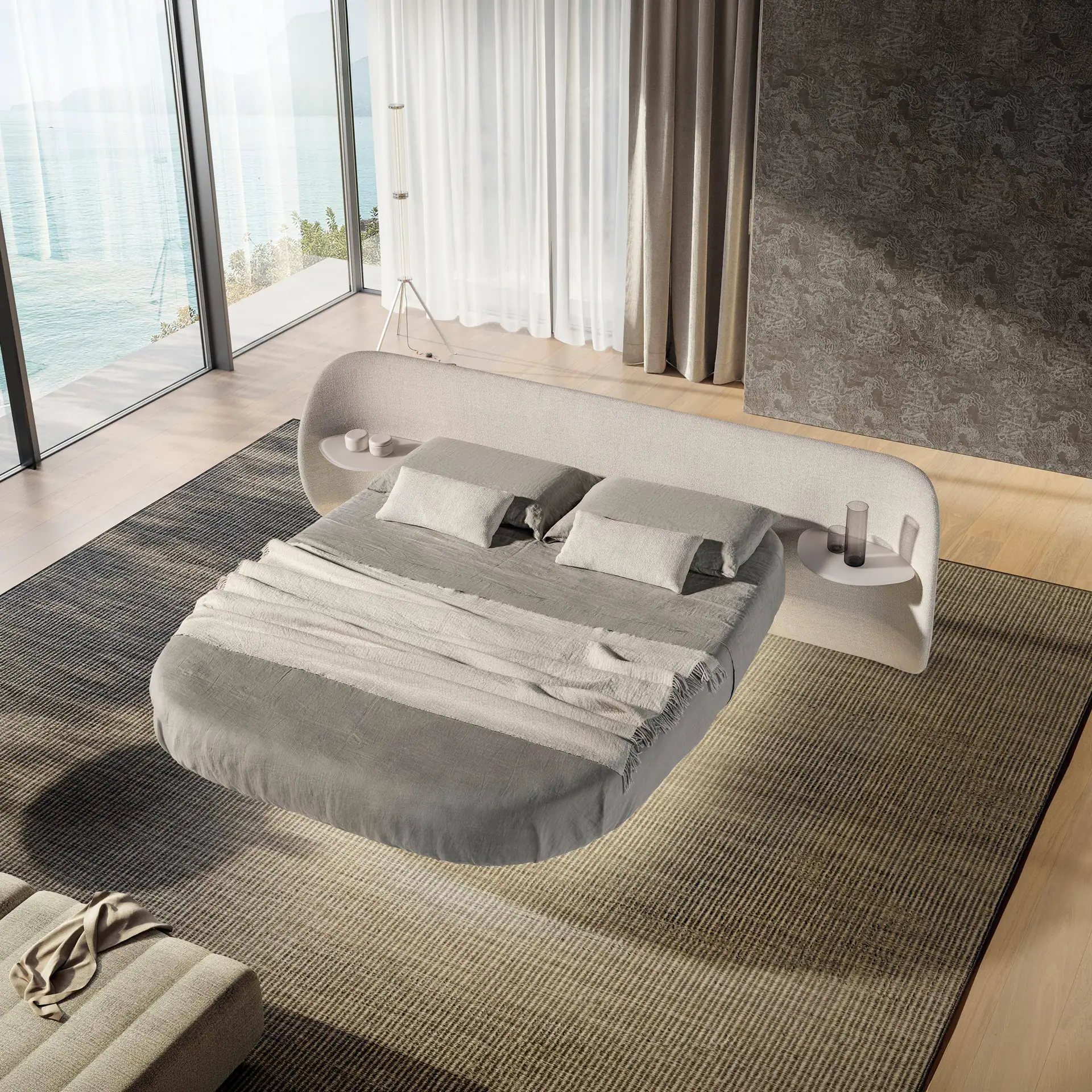 Modern round air bed with integrated side tables in a stylish bedroom.