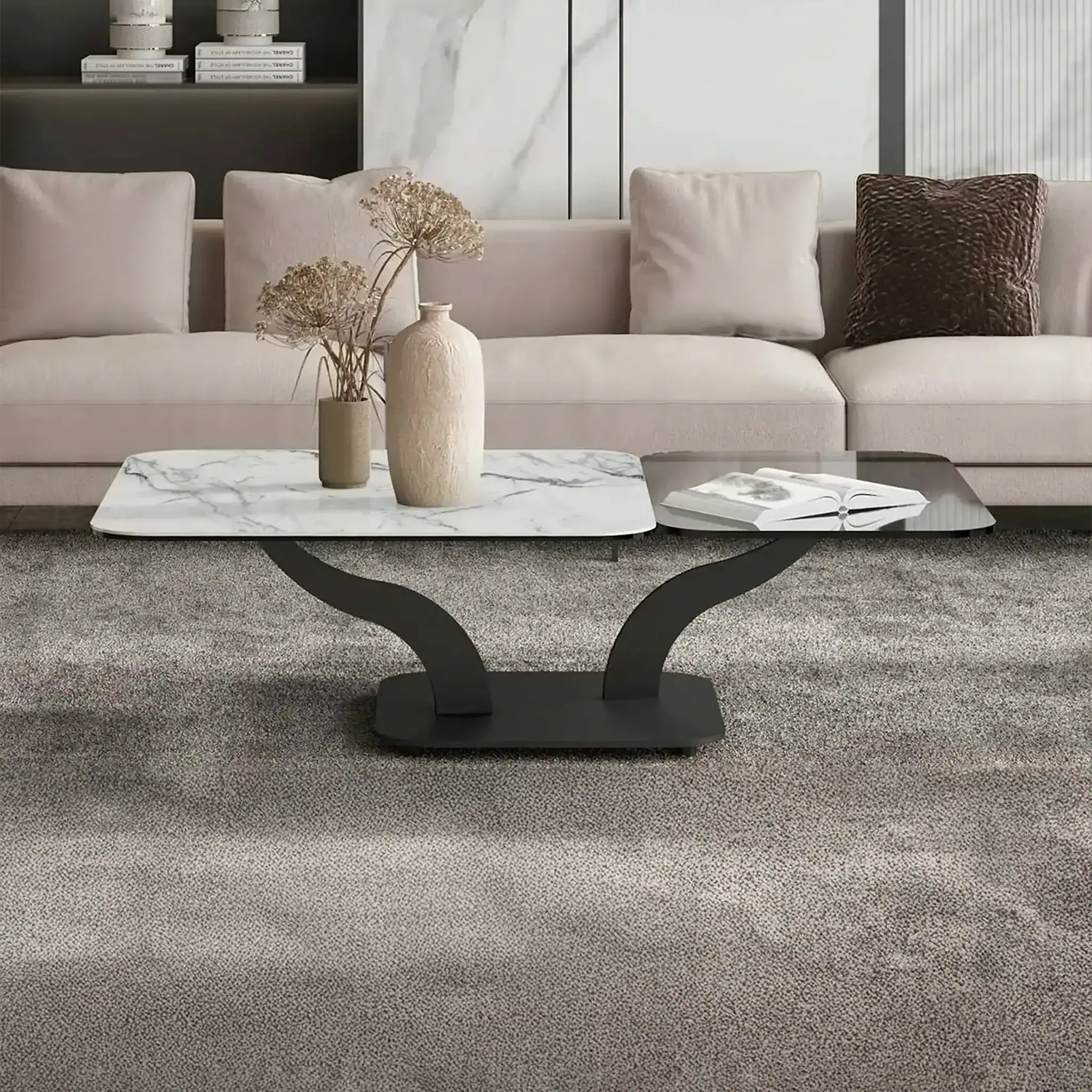 Modern Sinuoso extending coffee table with marble top and black base in living room.