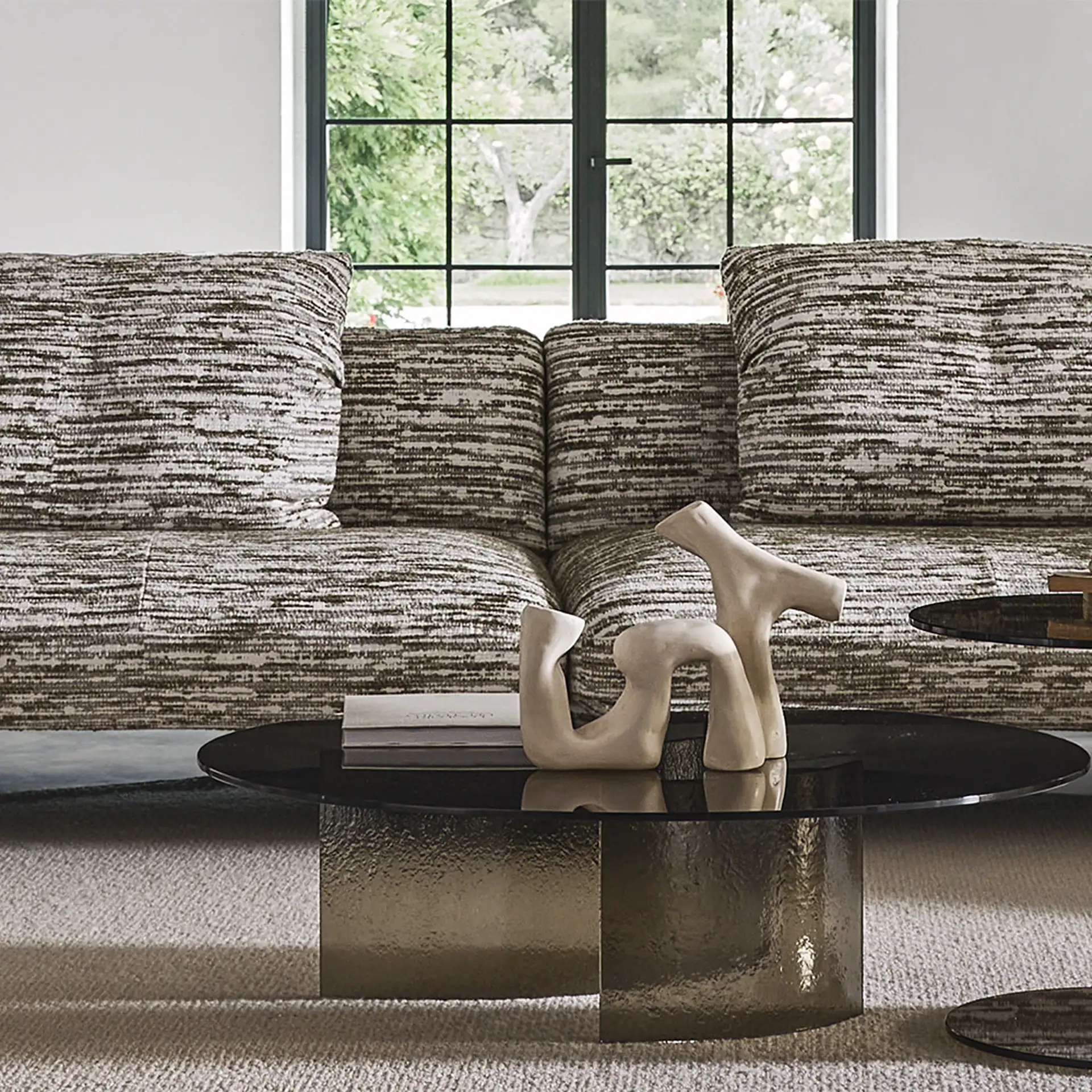 Fleur Modular Sofa with textured fabric in a modern living room setting.