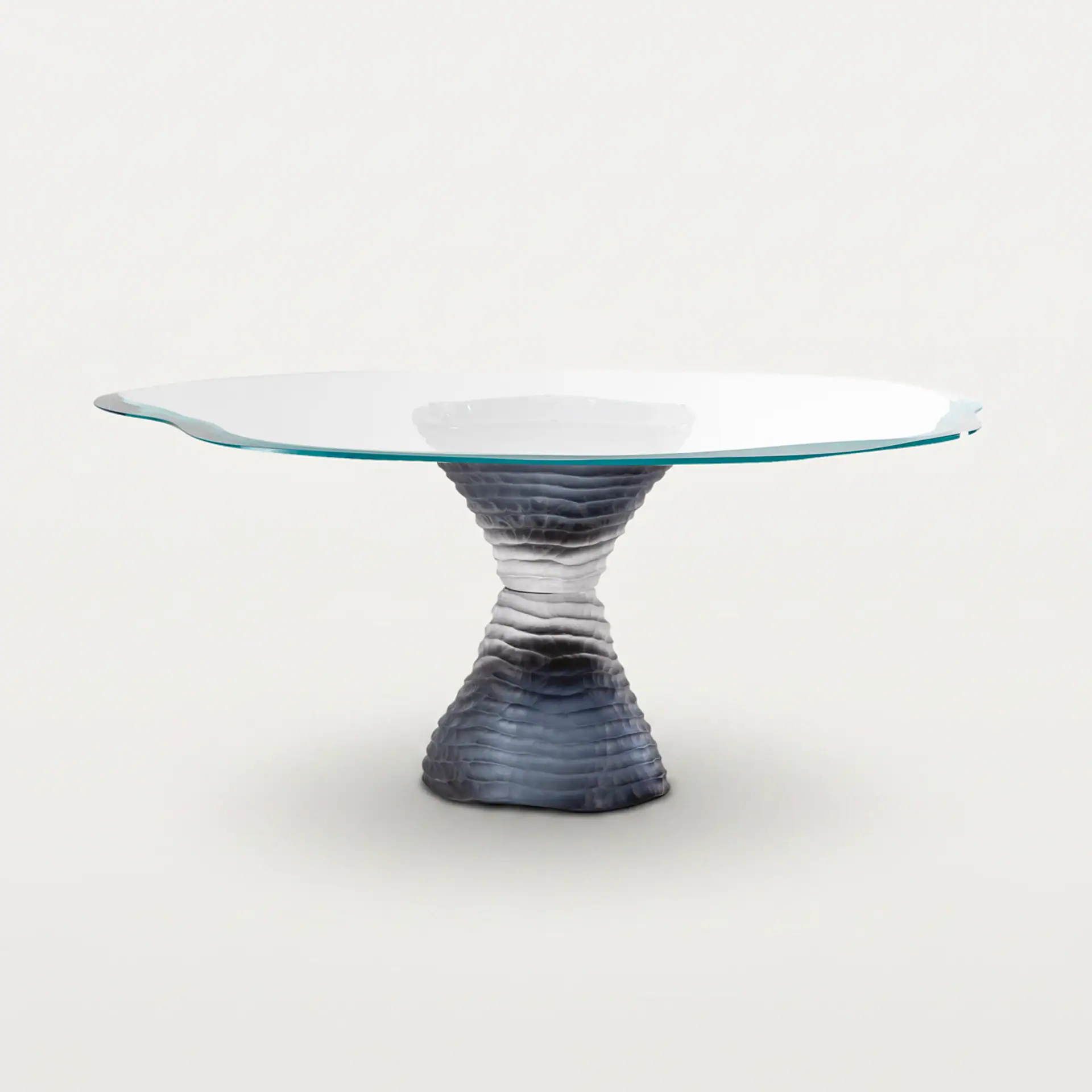 Murano 72 glass dining table with textured base and clear glass top.