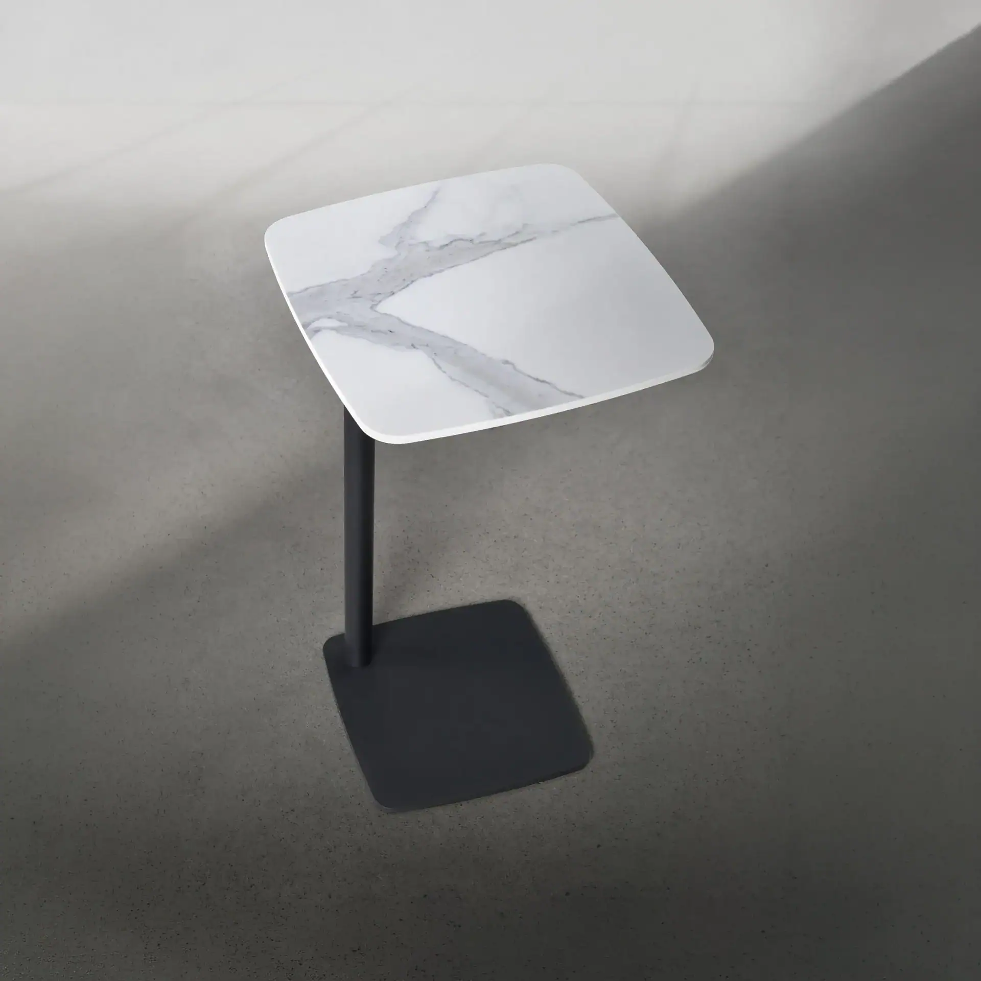Sklar Furnishings Leo Accent Table with marble top and black base.