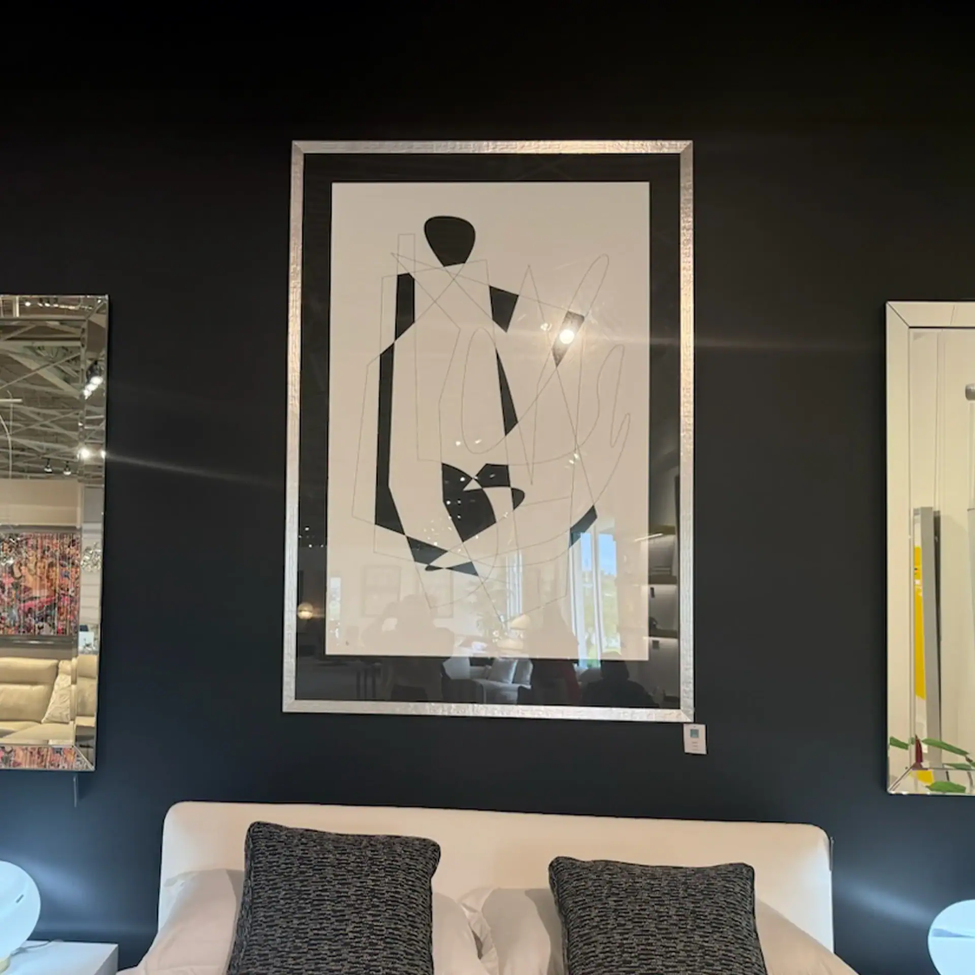 Modern abstract paper art piece titled Citrine II in a contemporary living room.