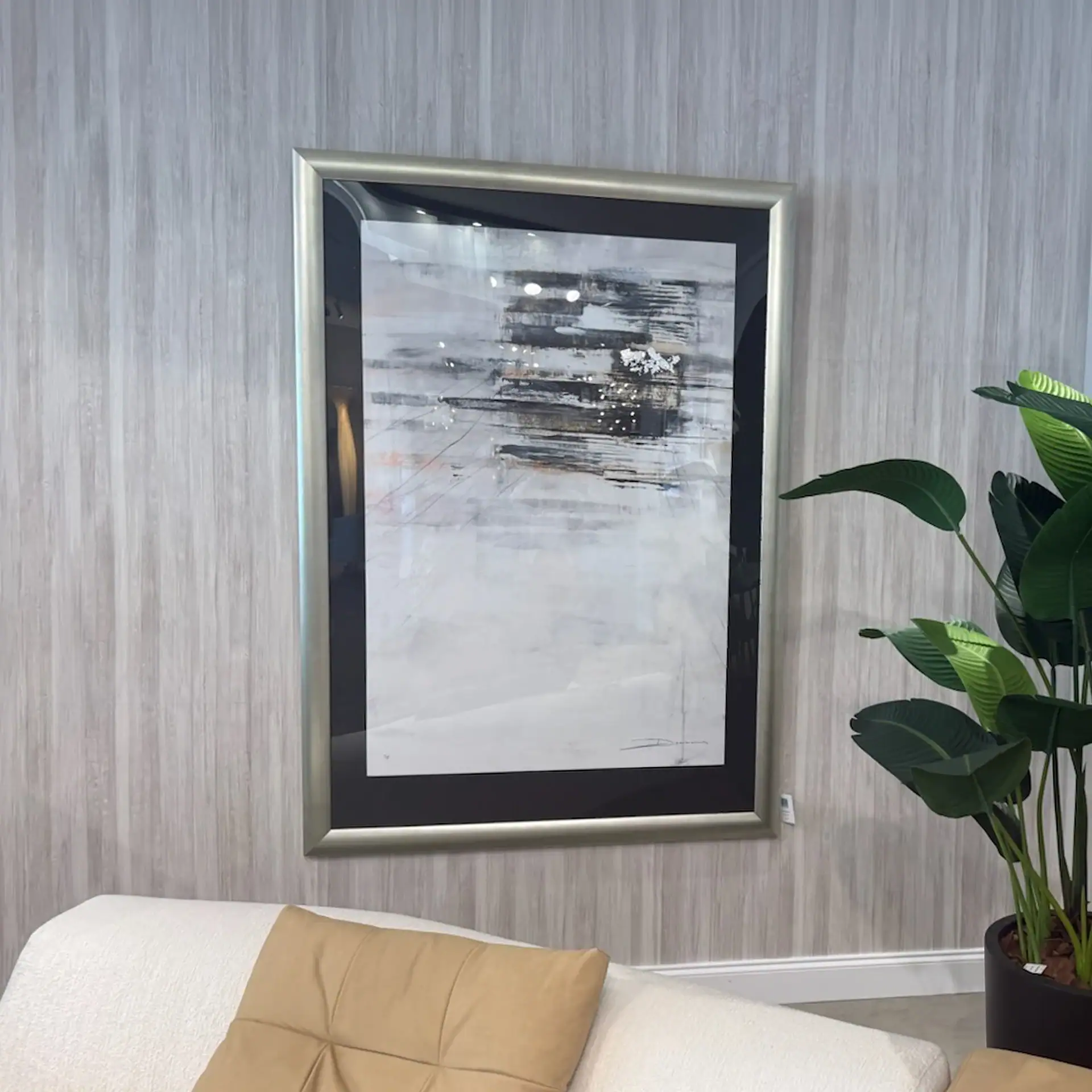 Elegant framed paper art titled Mosaic Lillies II on a textured wall.