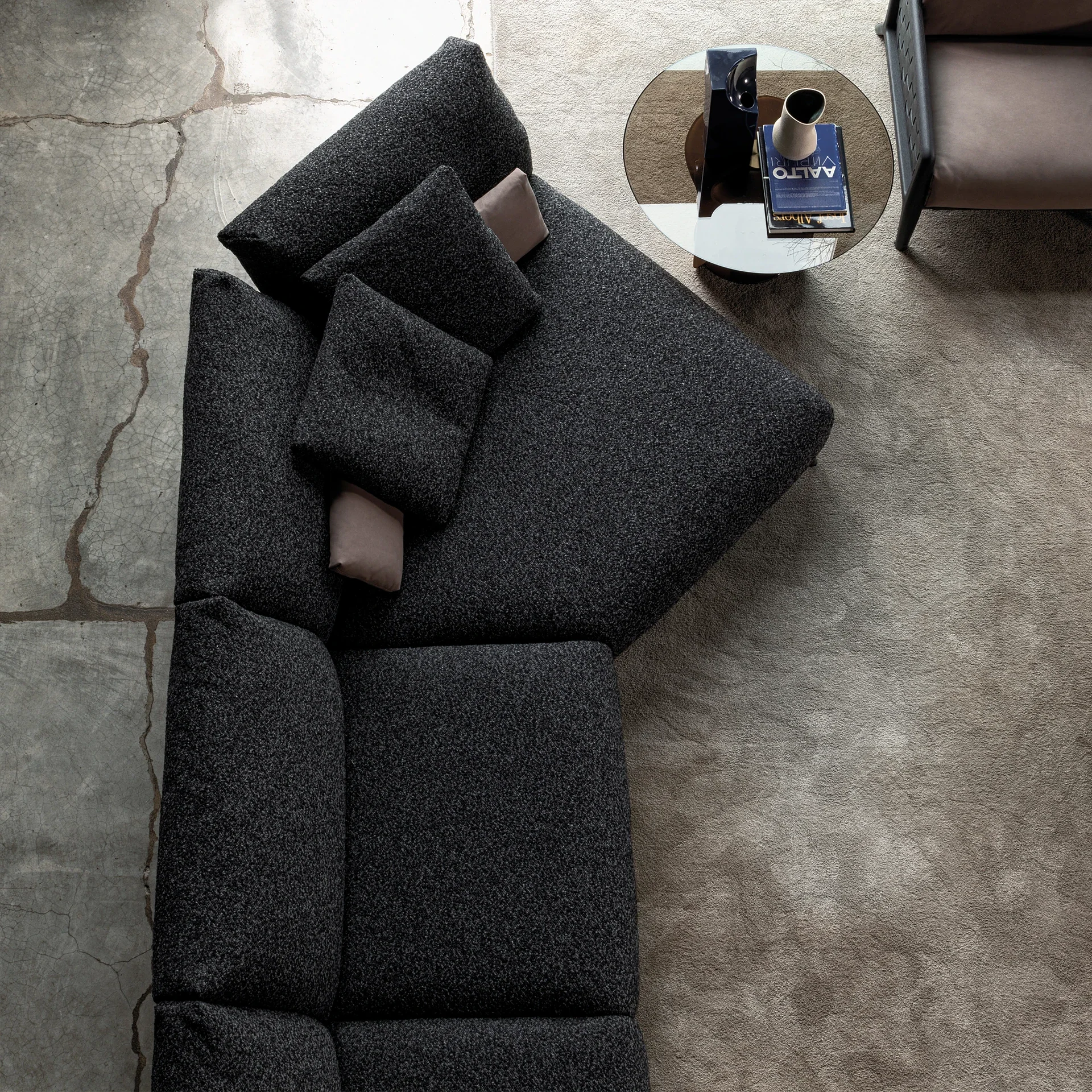 Sklar Furnishings Chapeau sofa dark fabric with cushions in a modern living space.
