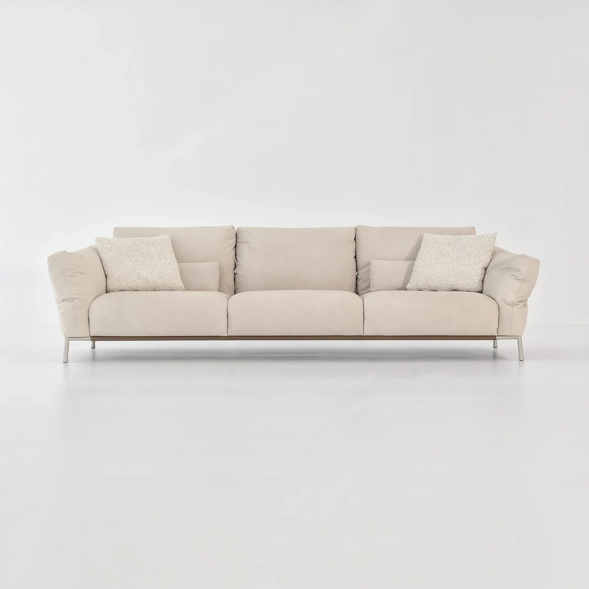 Chapeau modular sofa beige in a bright room.