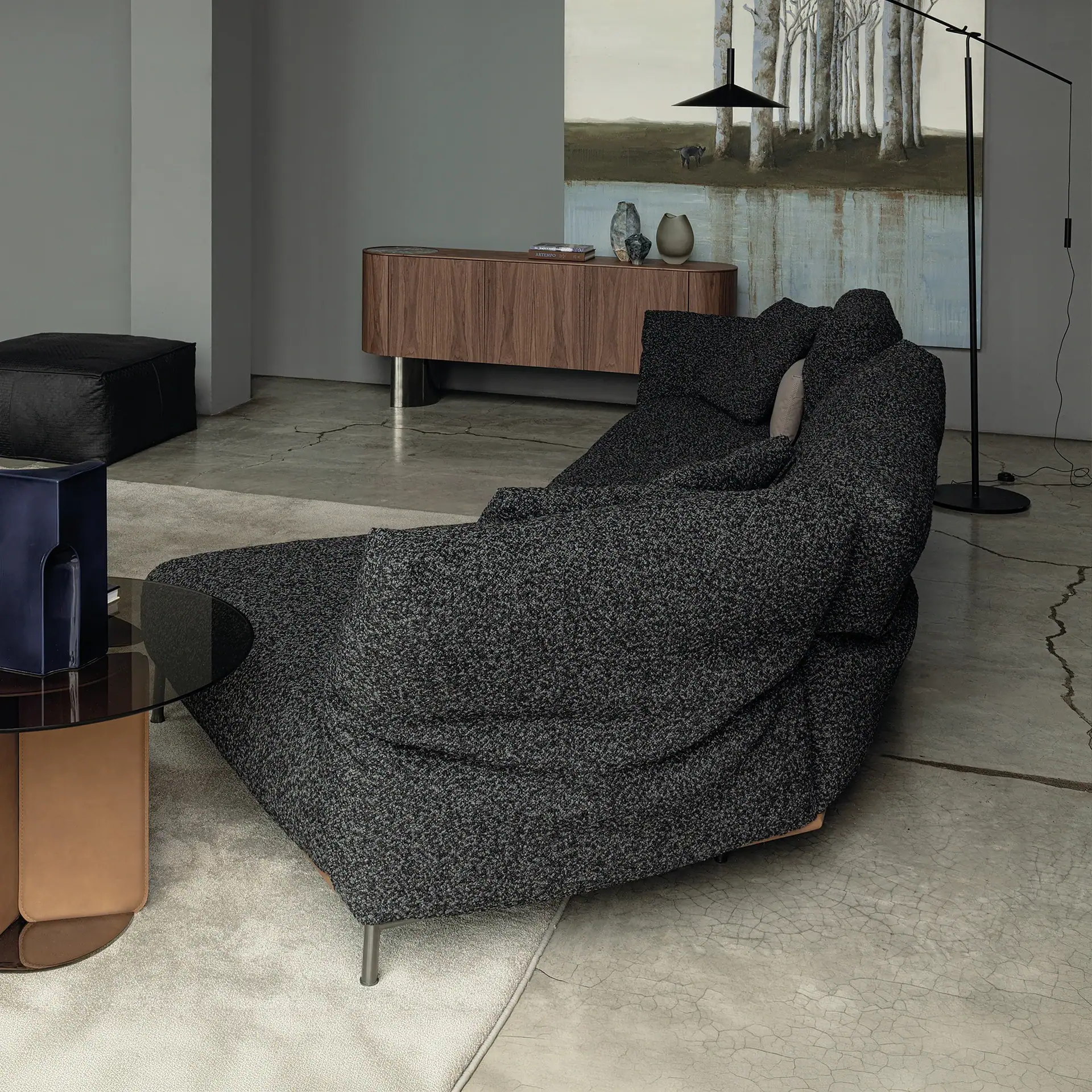 Modern black textured Chapeau modular sofa in contemporary living room.