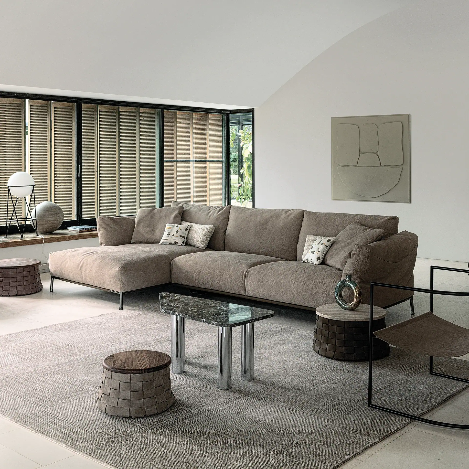 Modern modular sofa in a stylish living room with minimalist decor.