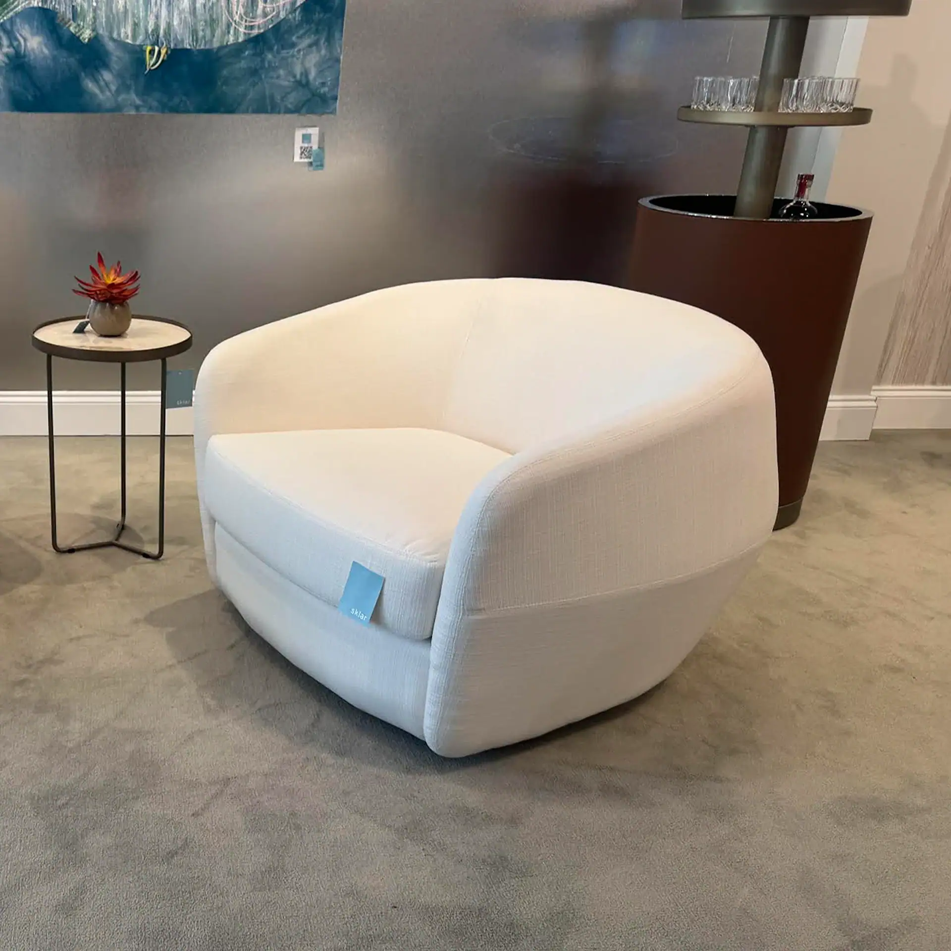 White modern lounge chair for stylish interior decor.