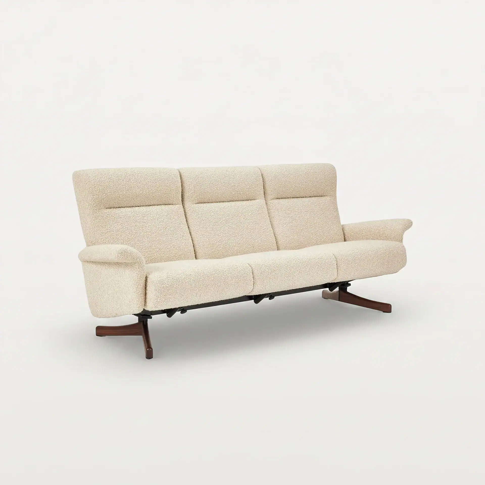 Cream-colored 3-seat sofa with wooden legs from Sklar Furnishings.