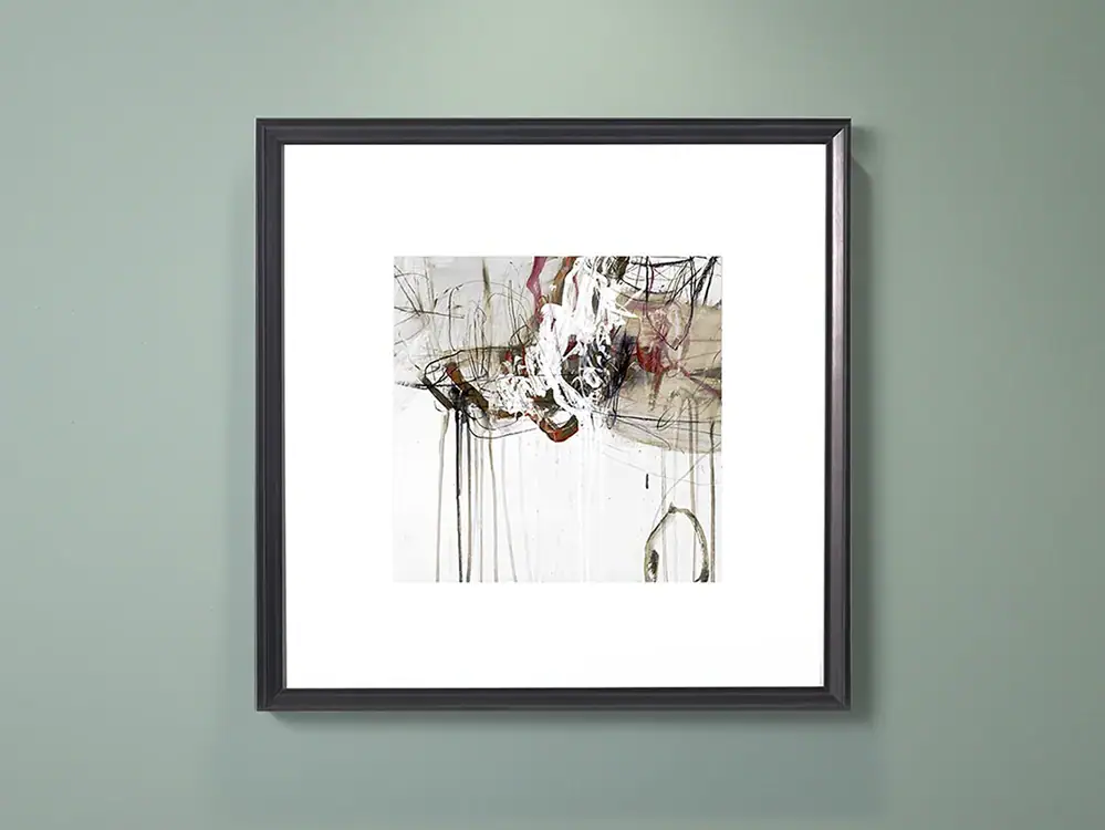 Abstract modern art piece in a black frame for contemporary decor.