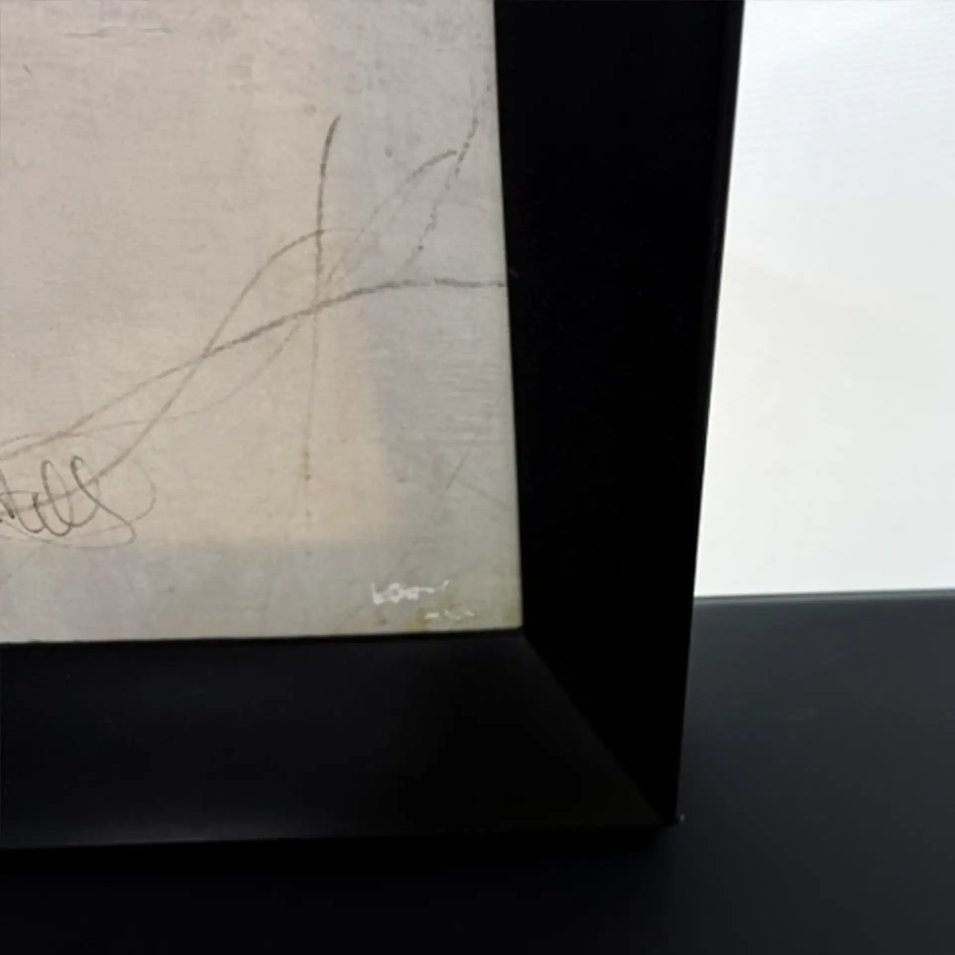 Close-up of contemporary wall art with black frame in San Antonio.