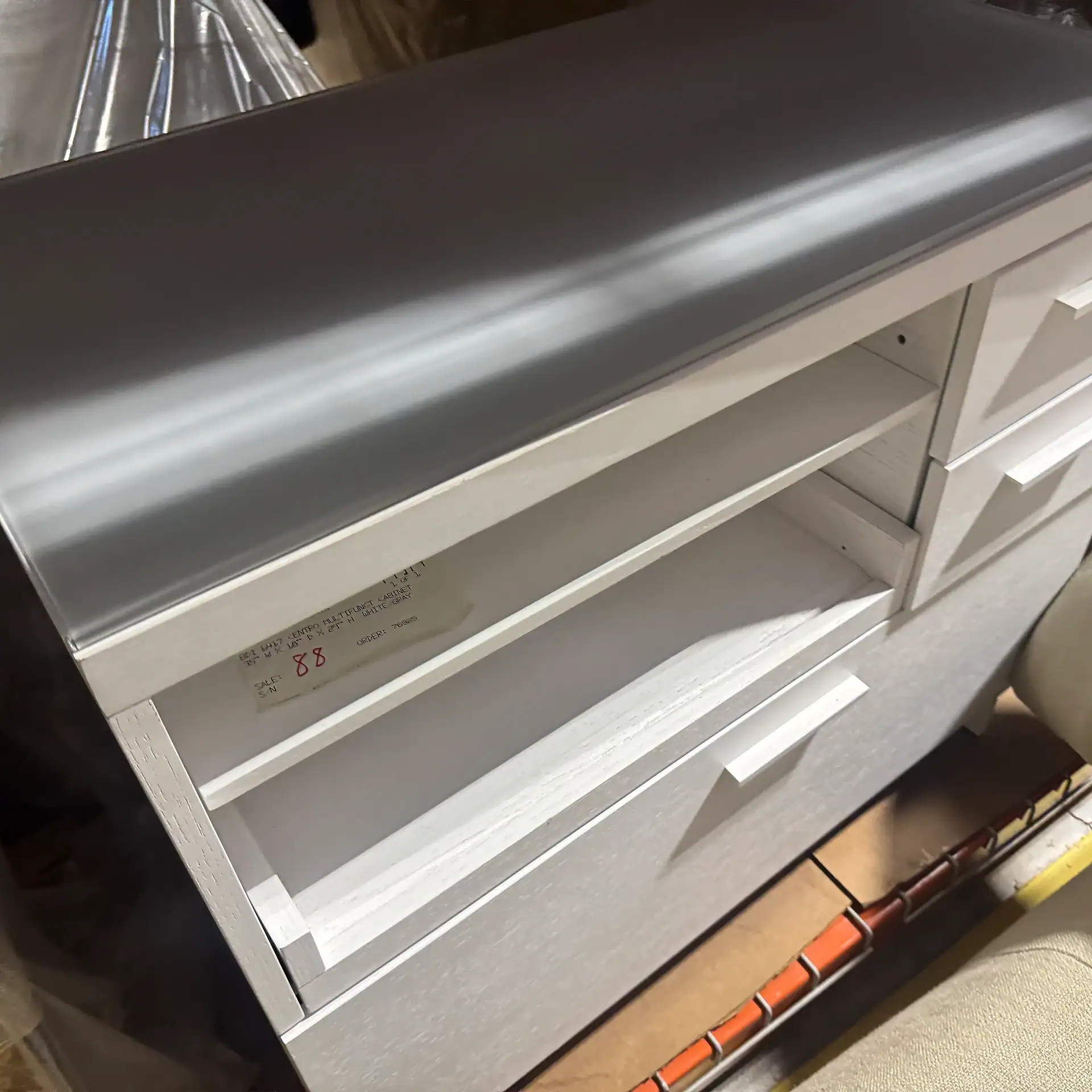 Modern BDI multifunction cabinet with open shelves and sleek design.