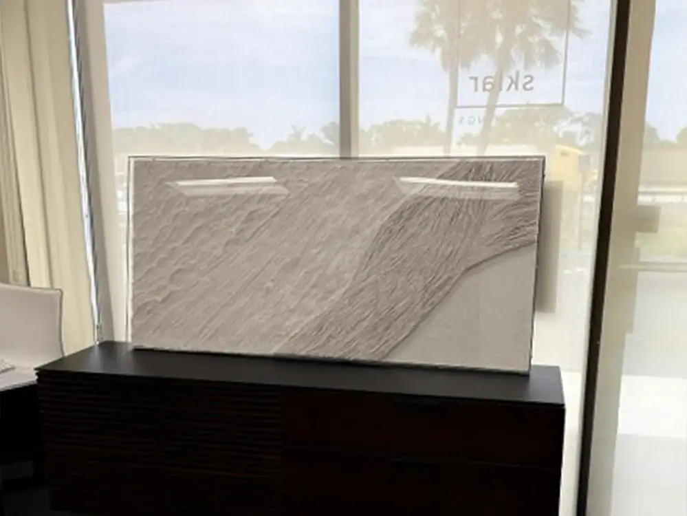 Modern wall art piece on display at Sklar Furnishings store.