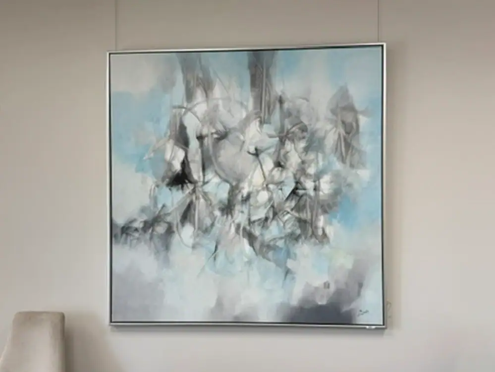 Abstract blue and white wall art for contemporary interior decor.