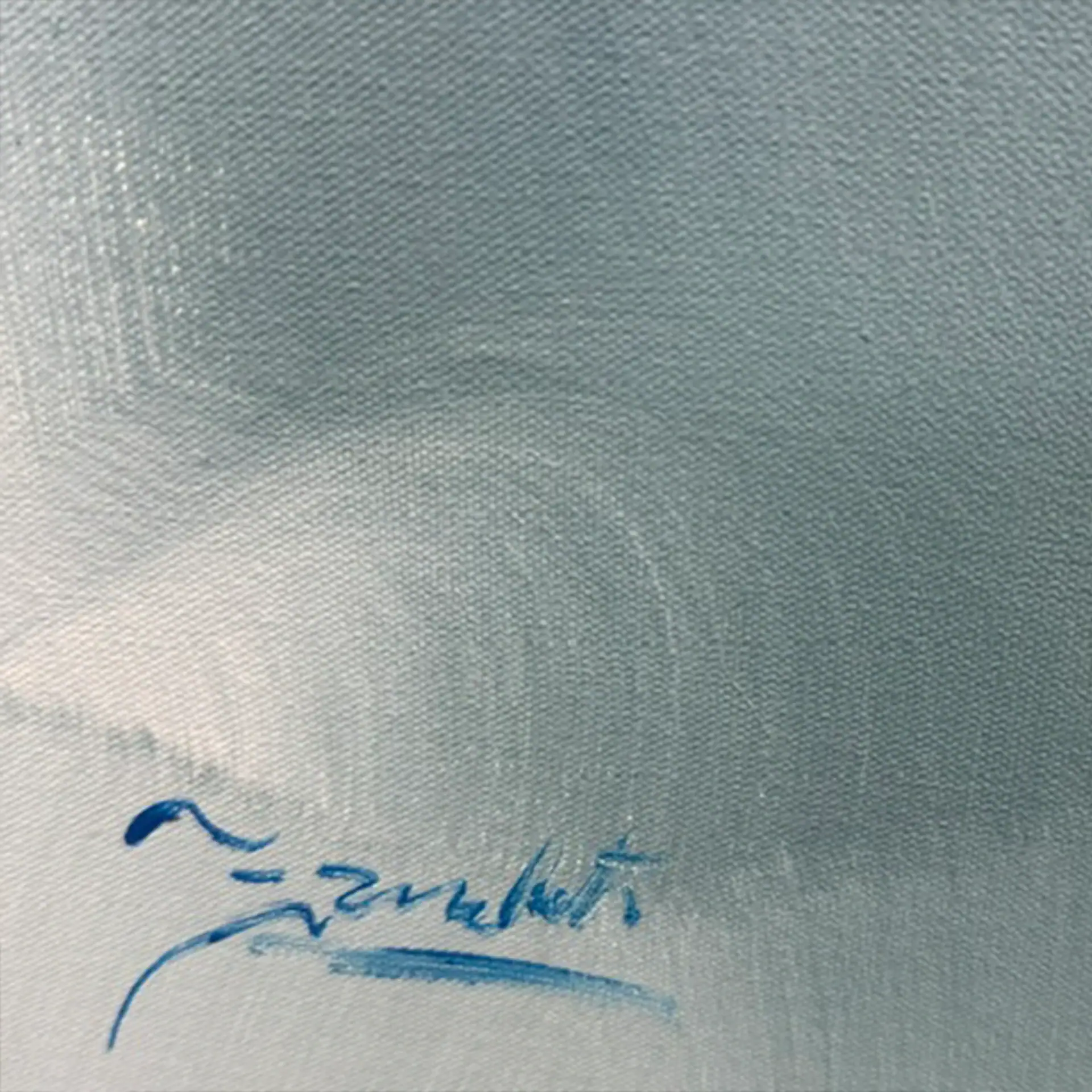 Close-up of a signature on textured wall art piece from Sklar Furnishings.