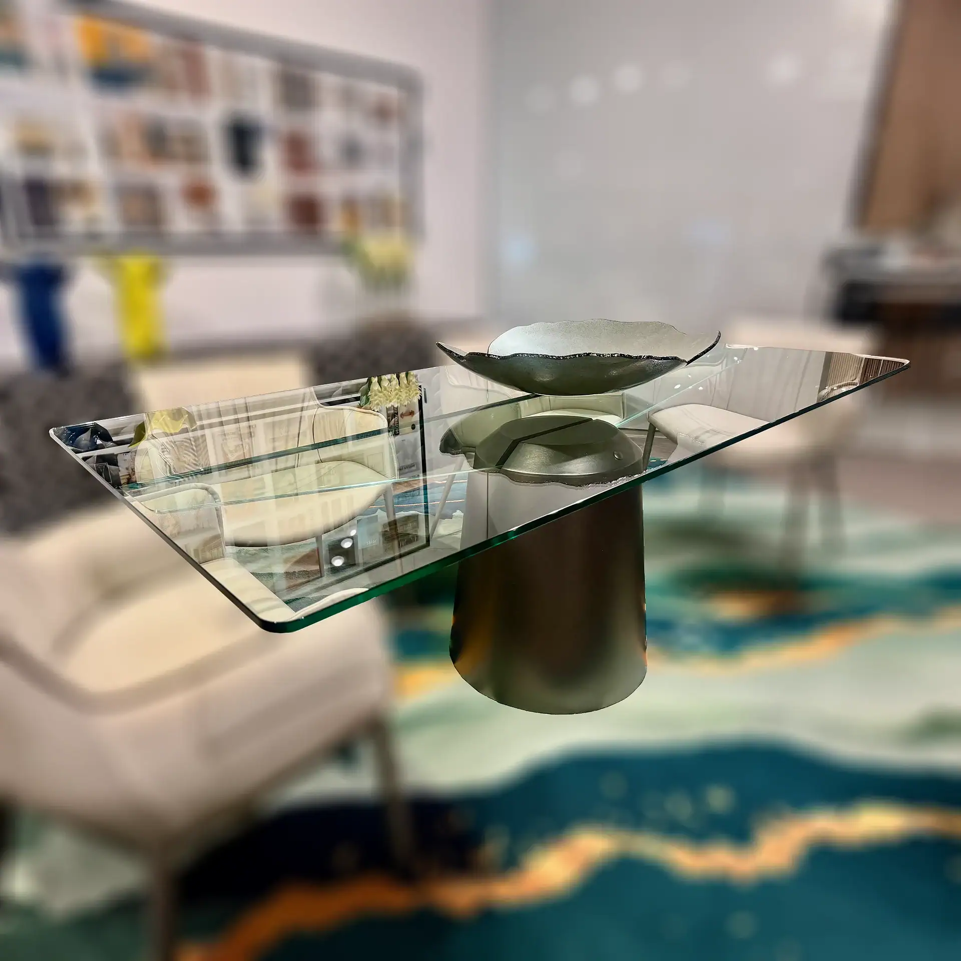 Modern glass dining table with unique base in a stylish interior.