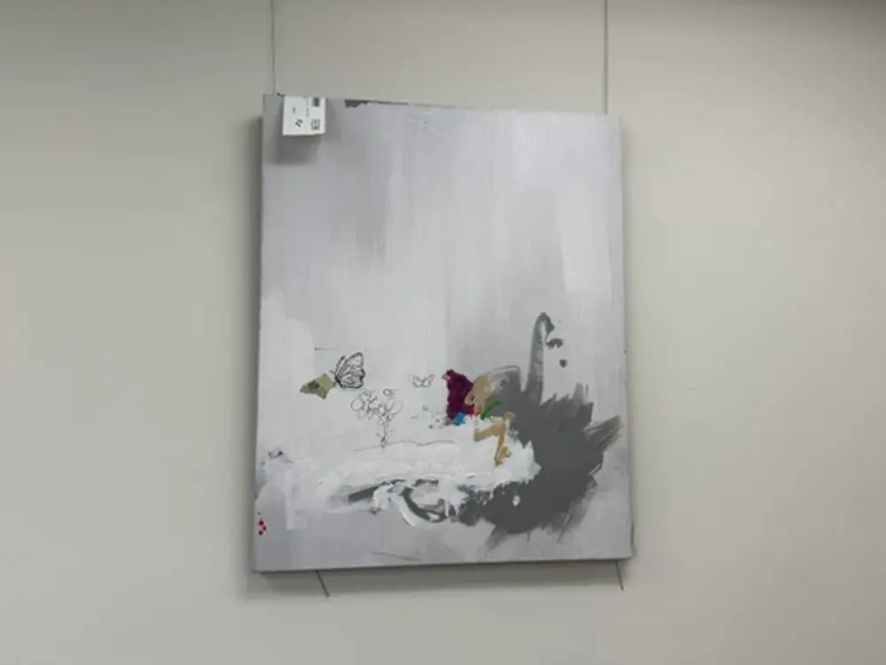 Modern abstract painting of a swan with colorful accents.