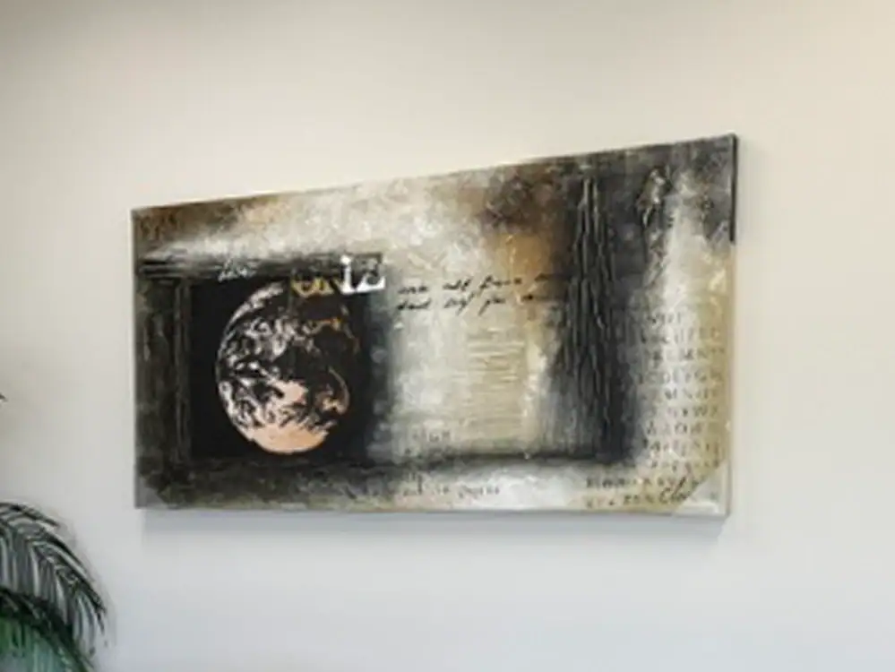 Modern abstract wall art with Earth motif for stylish home decor.