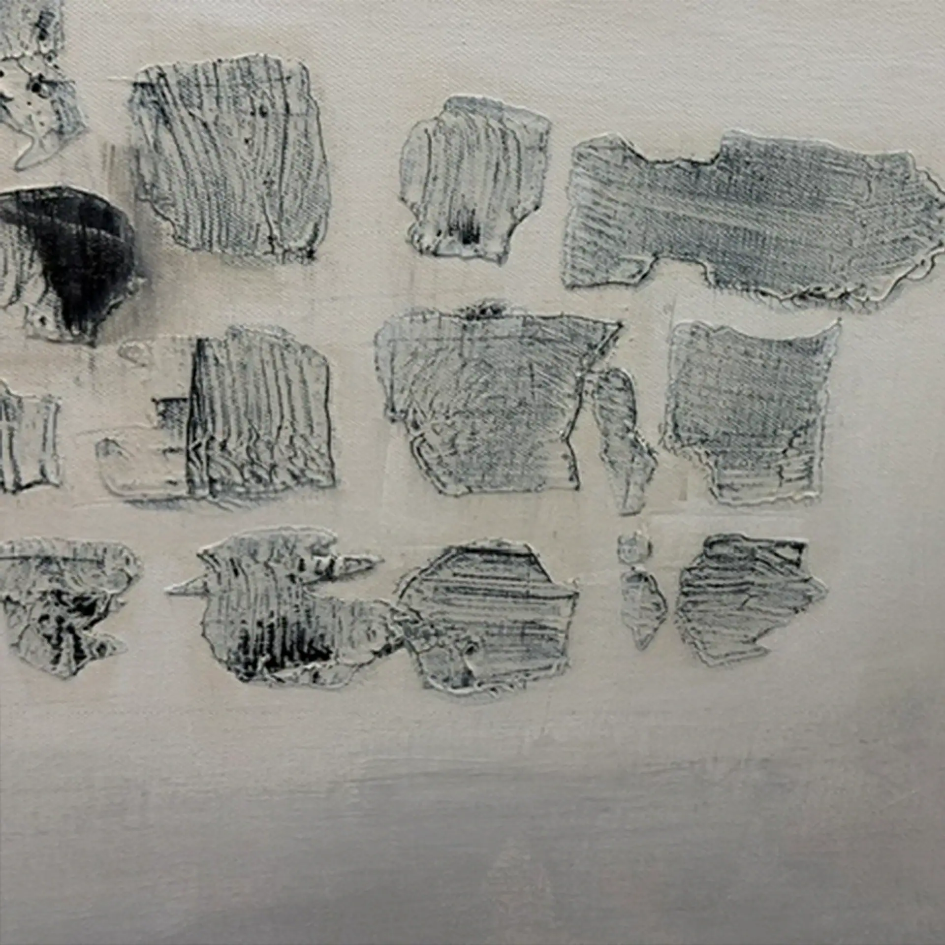 Abstract wall art with textured gray stone-like patterns.
